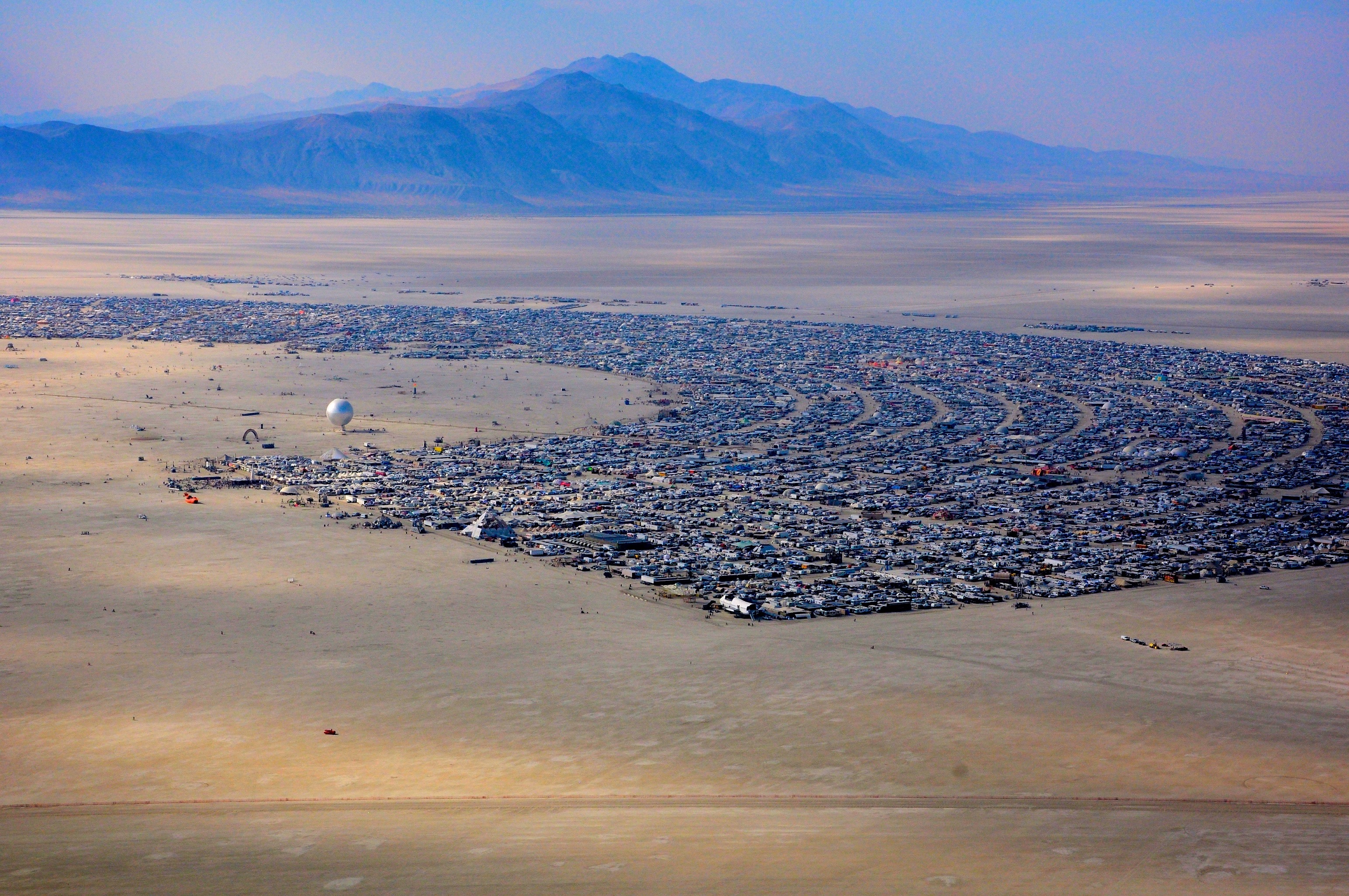 An aerial photograph by Will Roger of the recently concluded Burning Man festival in Black Rock City that’s created and taken down for the annual gathering in Nevada’s Black Rock Desert.
