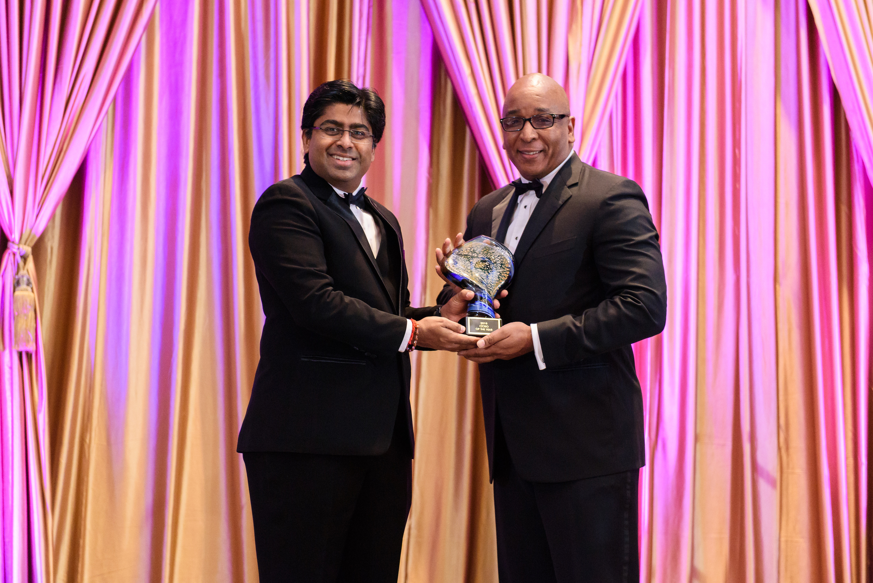 Anthony Dupree, CISO & CIO of Career Builder, accepts his award from Jay Bavisi, CEO, EC-Council Group and Chairman of the Board, EC-Council University