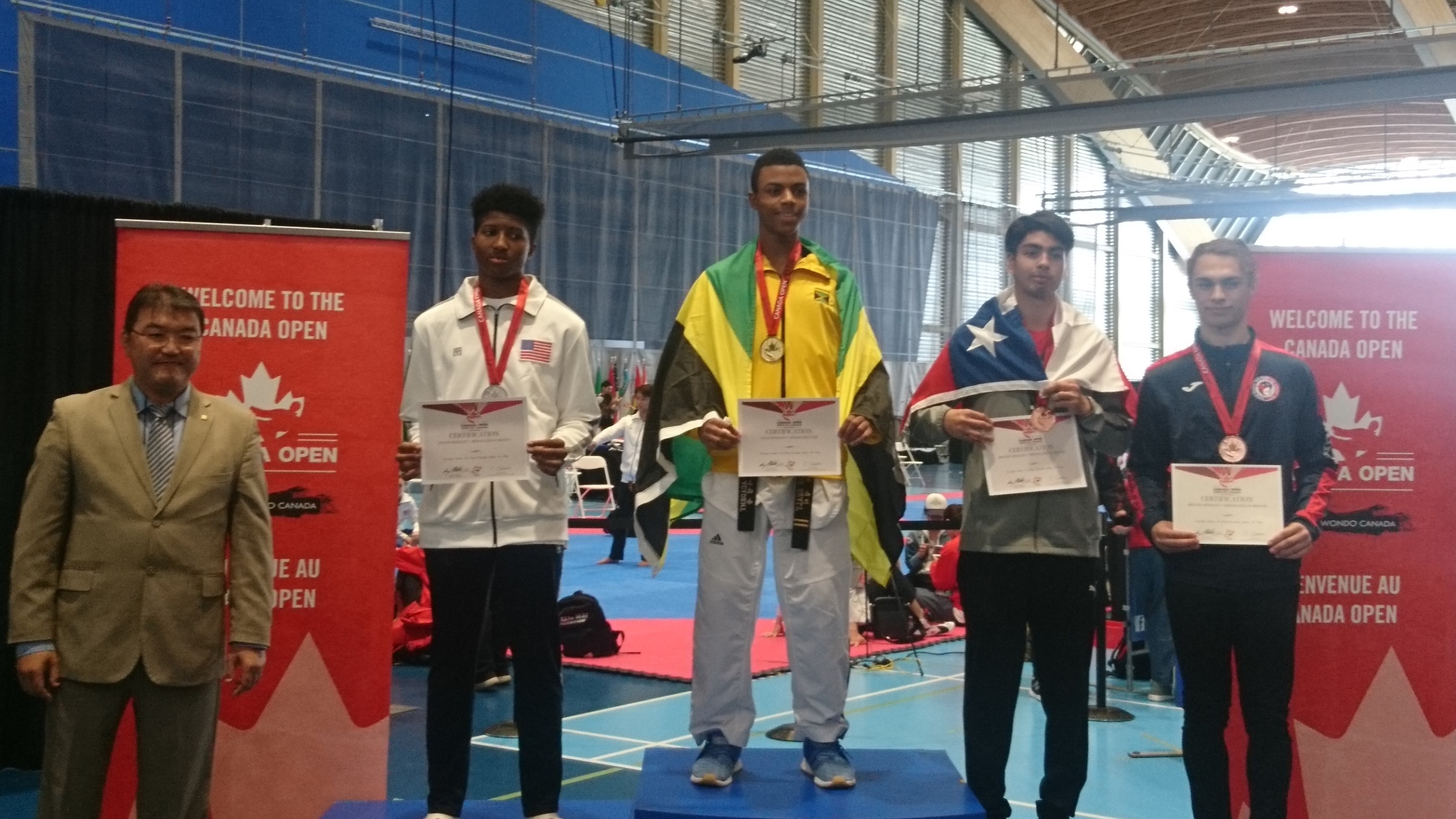 Brandon Sealy Accepts Gold for Jamaica in Canada Open