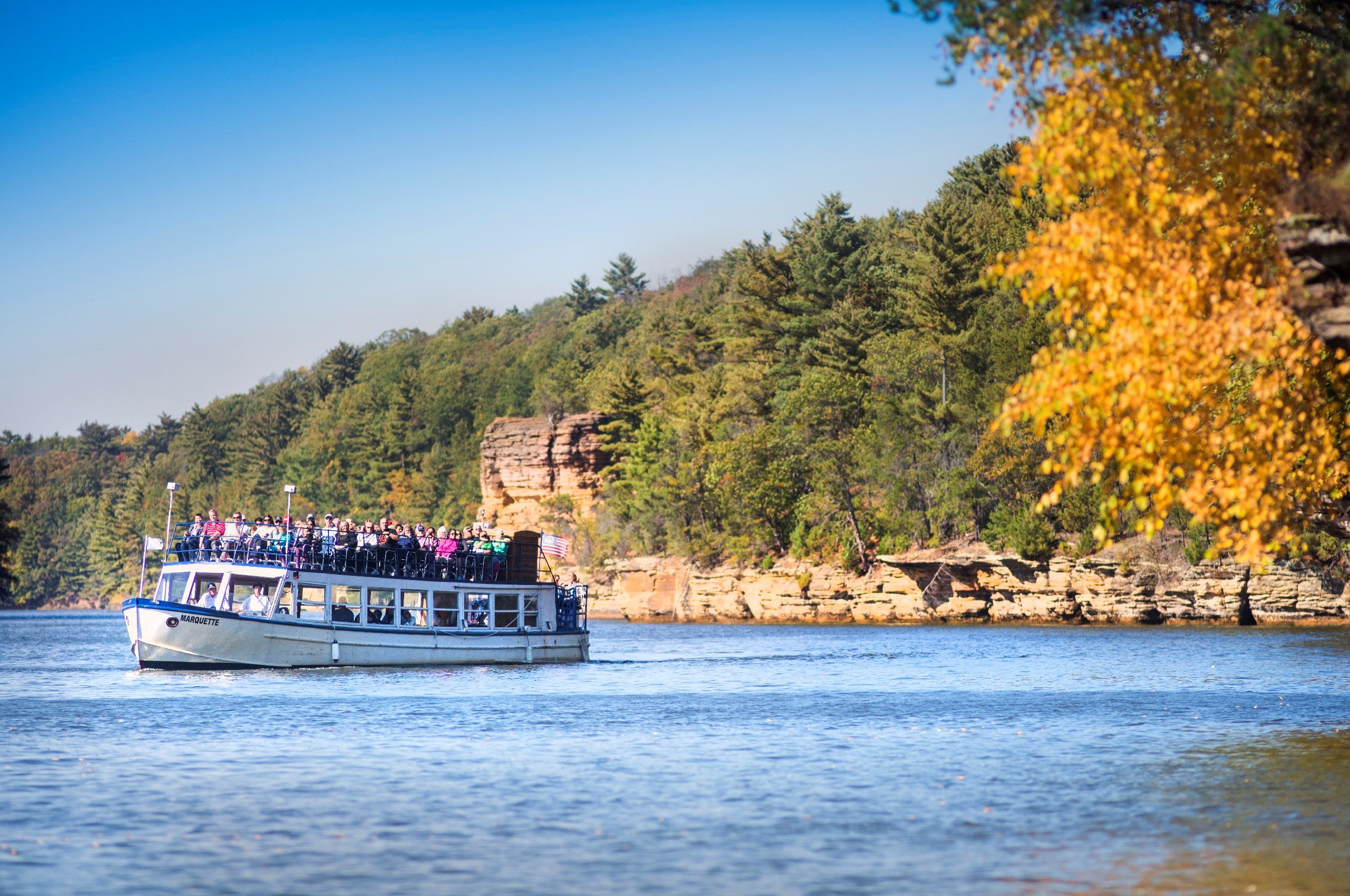 On a Dells Boat Tour is one of the best ways to take in the changing fall color.