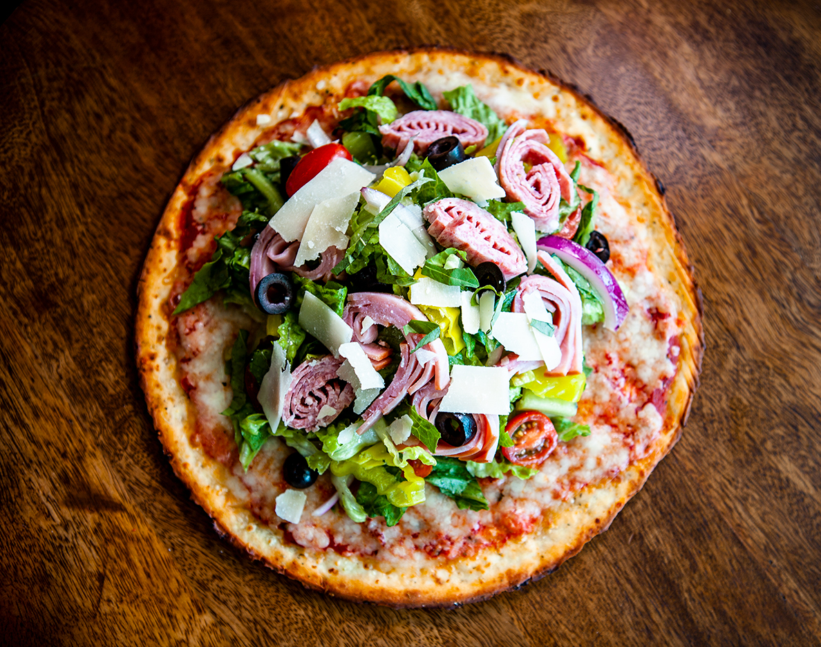 zpizza's Antipasto pizza salad on gluten free cauliflower crust
