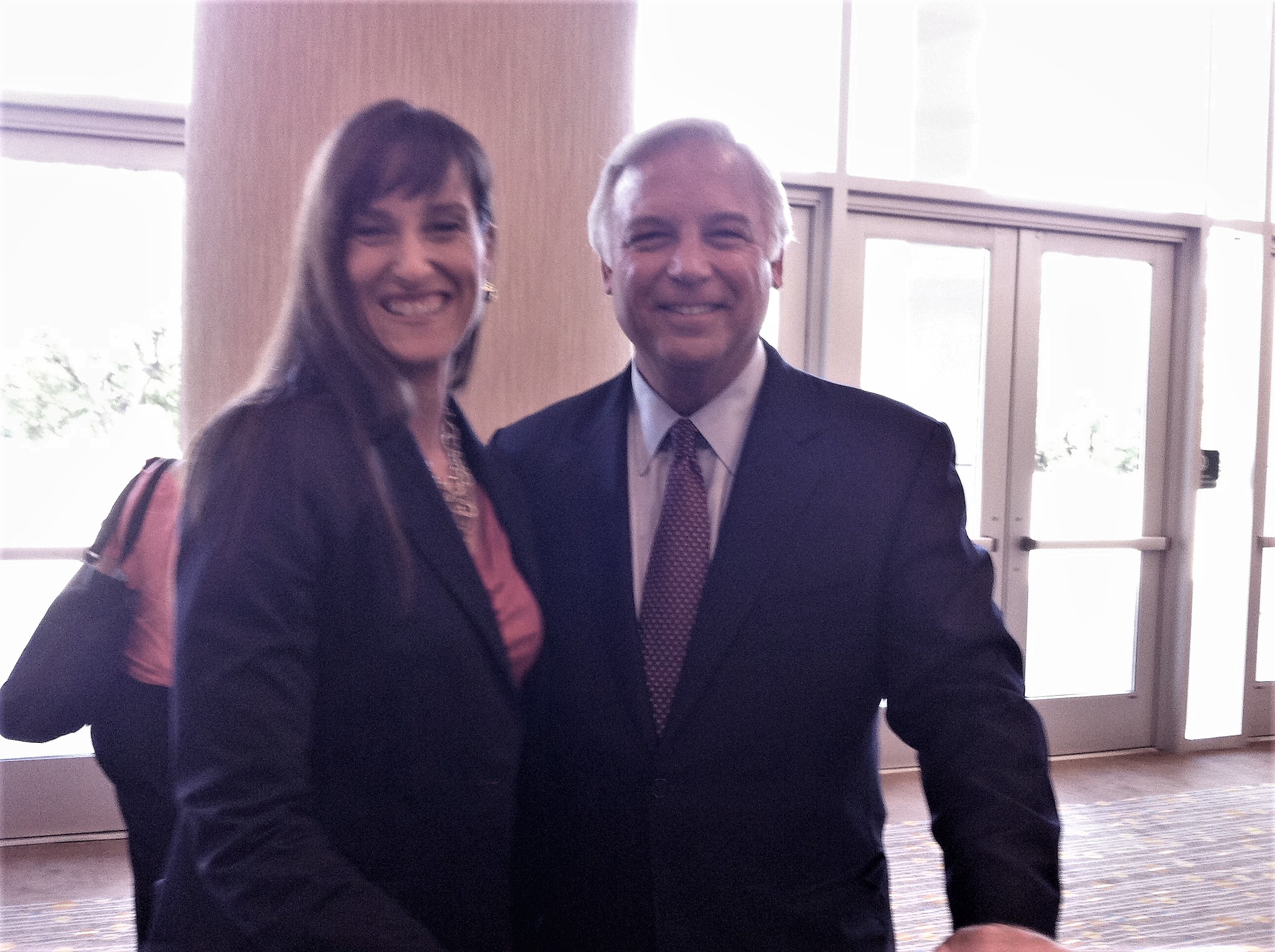 Dr. Nathalie Beauchamp with Jack Canfield at an annual eWomen Network Conference in Dallas.