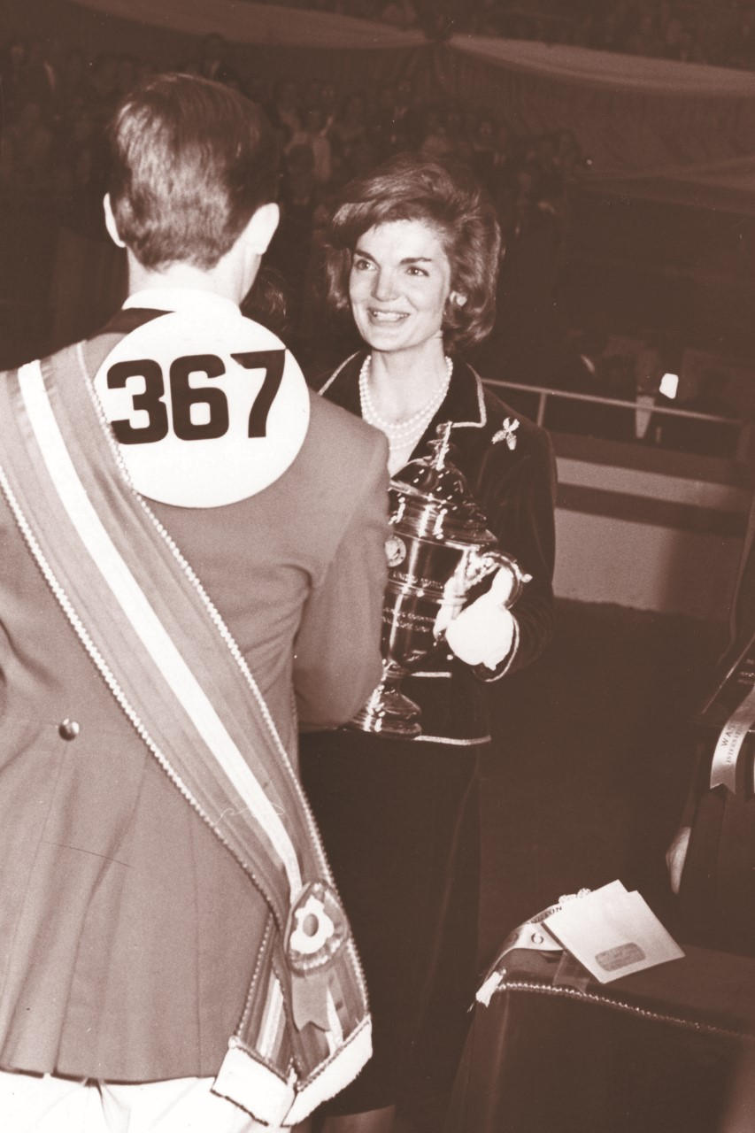 Jackie Kennedy presenting the President’s Cup trophy, which she commissioned from Tiffany’s, at the Washington International Horse Show.