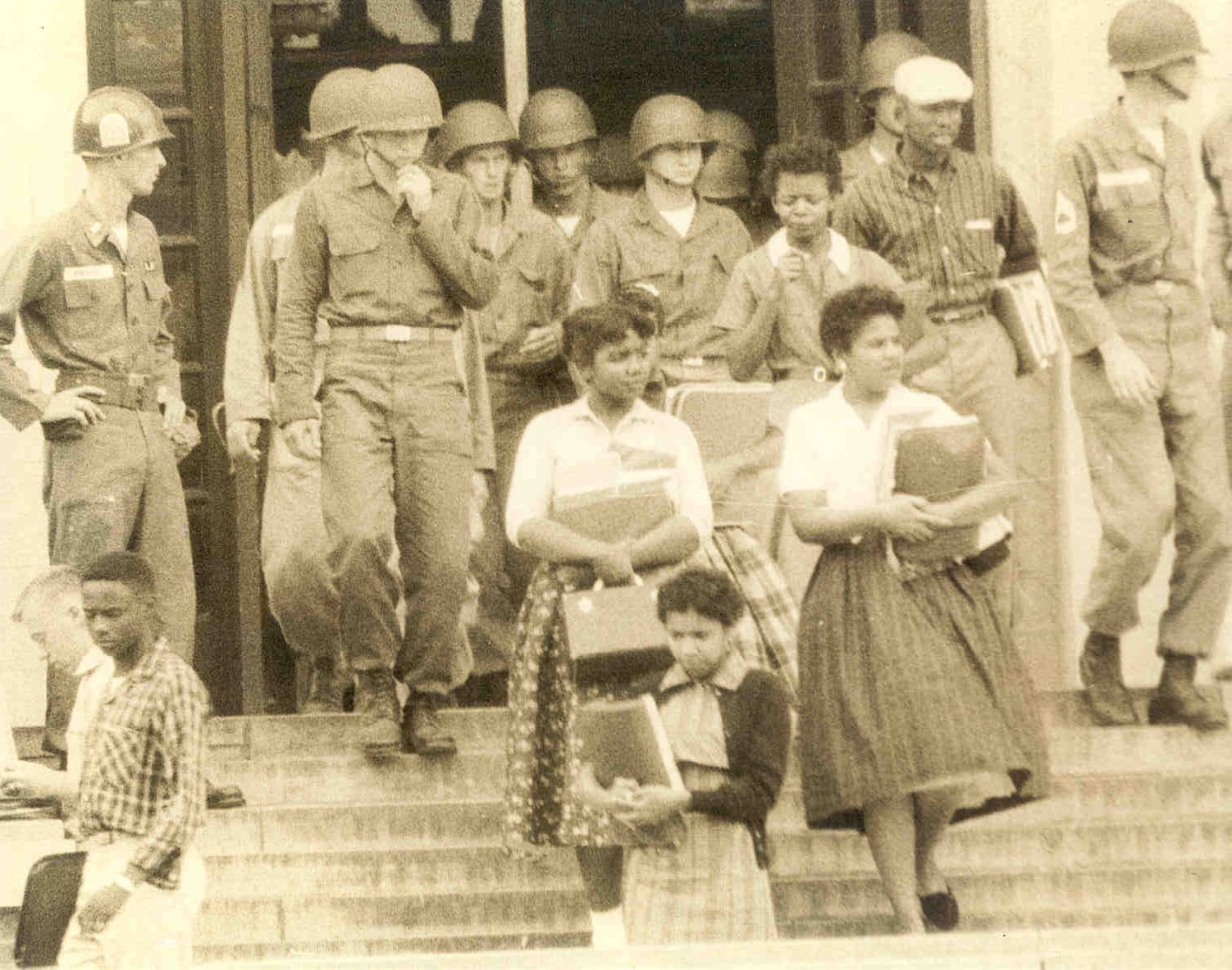 Elizabeth Eckford and the Little Rock Nine being escorted by the 101st Airborne Division.