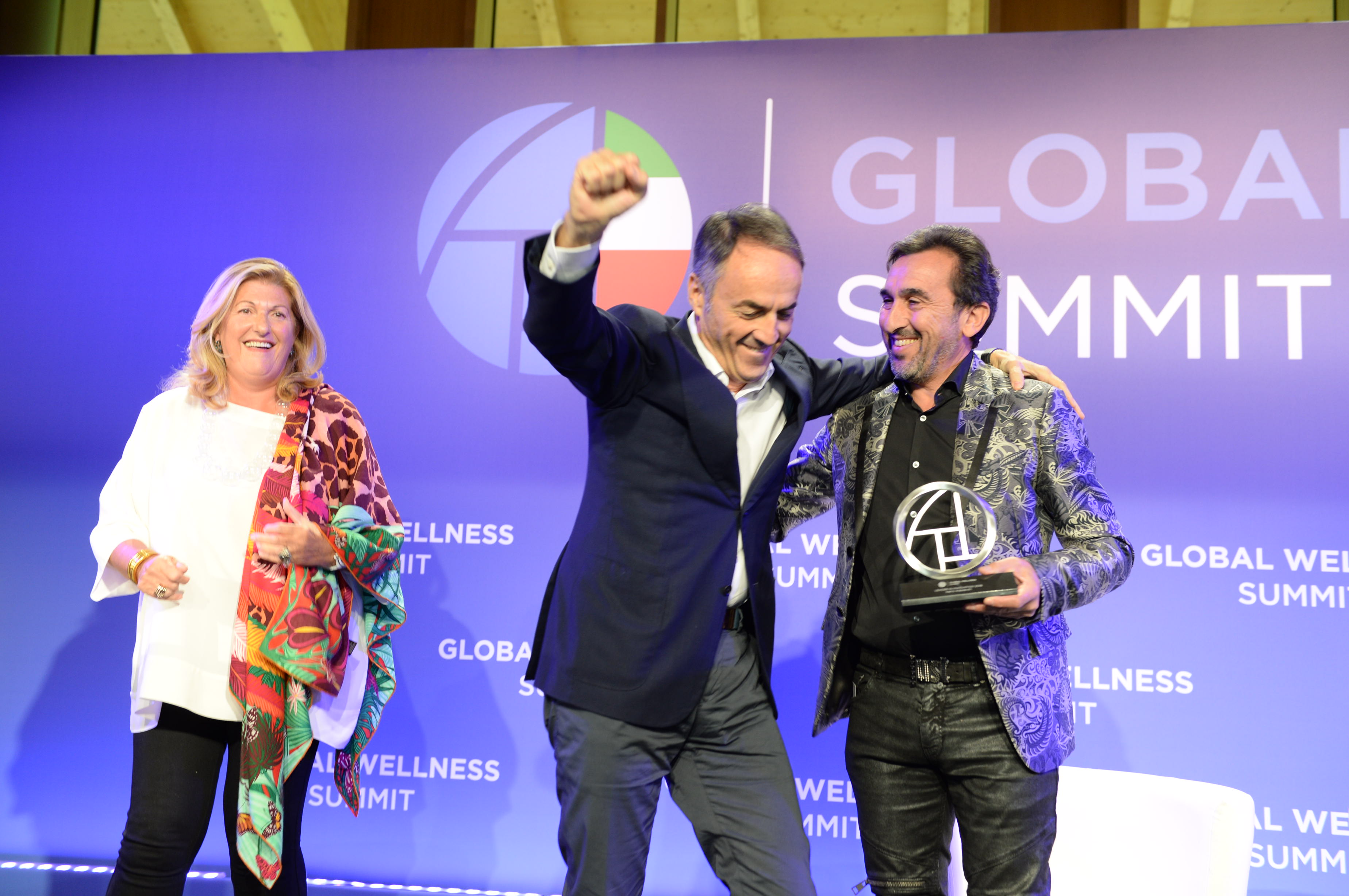 Founder  Nerio  Allessandri ,   celebrates  after  winning  a   Global  Wellness  Award: Leader in Innovation.