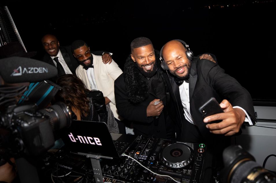 Jamie Foxx poses with DJ D-Nice as Foxx co-hosts a launch party for the new line of men's skin care, Lumiere de Vie Hommes , on board the Utopia IV superyacht.