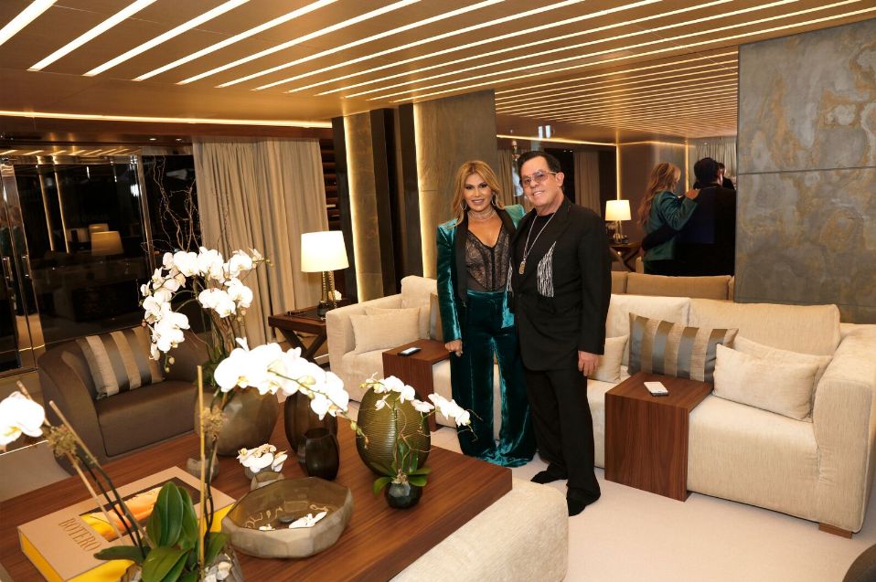 Loren and JR Ridinger on board the family superyacht, Utopia IV, to celebrate daughter and millennial entrepreneur, Amber Ridinger-McLaughlin's launch party for Lumiere de Vie Hommes.