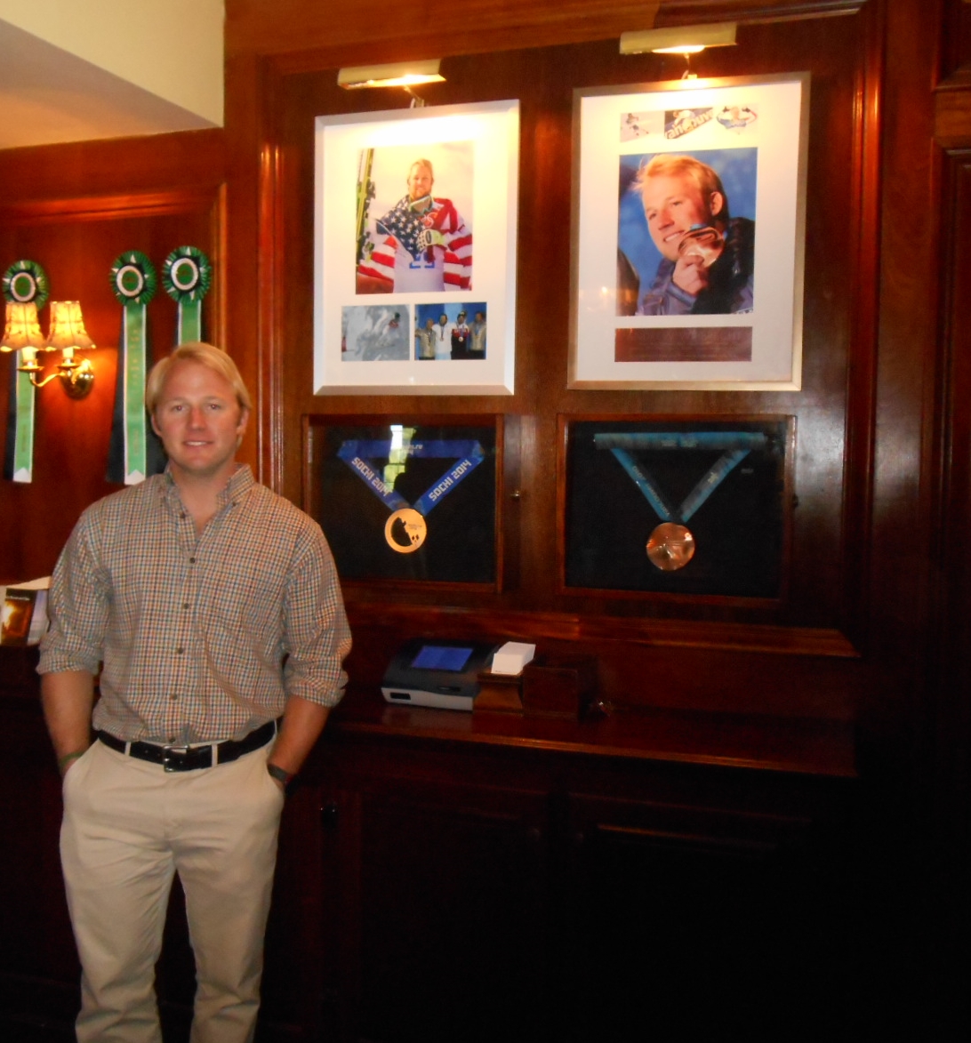 Andrew Weibrecht's Olympic ski medals greet guests at the hotel front desk