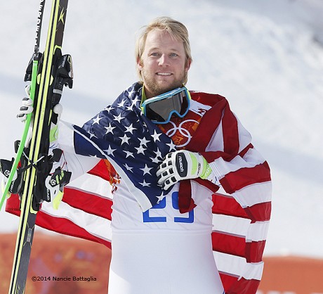 Andrew Weibrecht proudly displays the Stars and Stripes shortly after winning his Olympic silver medal in Sochi
