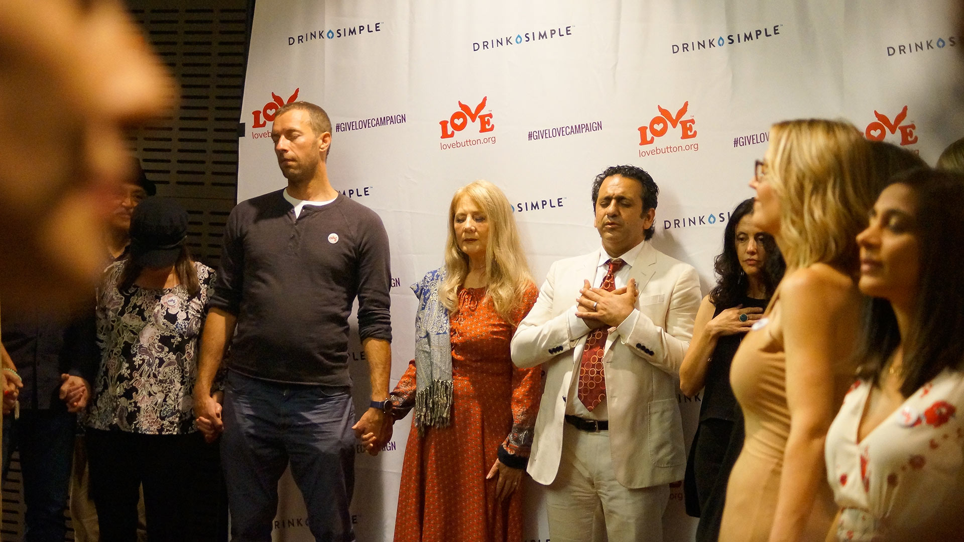 Love Button Co-Founder Habib Sadeghi along side supporters and Chris Martin of Coldplay for #GiveLoveCampaign Fundraiser