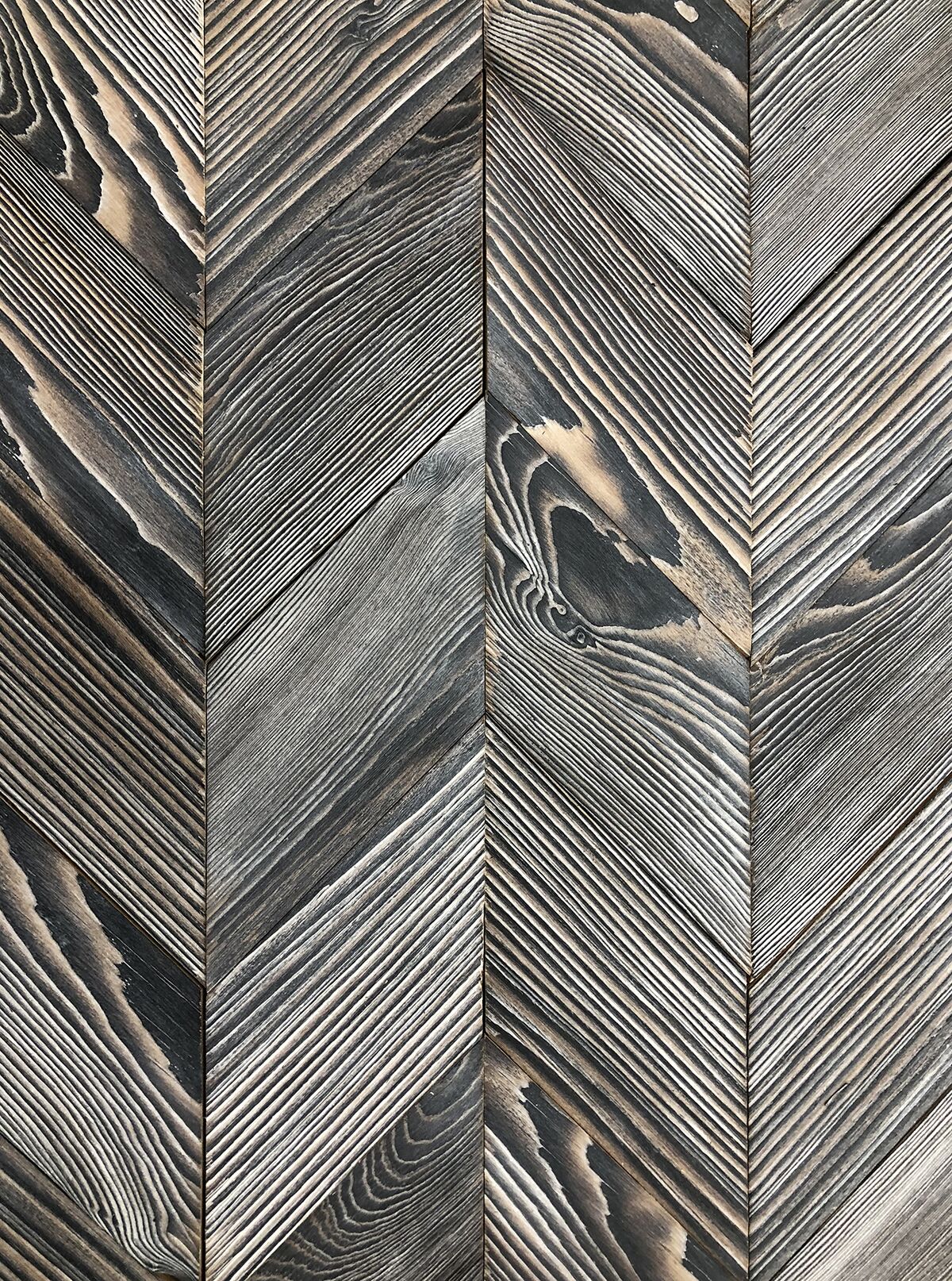 Shou Sugi Ban Shallow Char with custom color finishes in a Chevron pattern is a popular trendsetter at Pioneer Millworks.