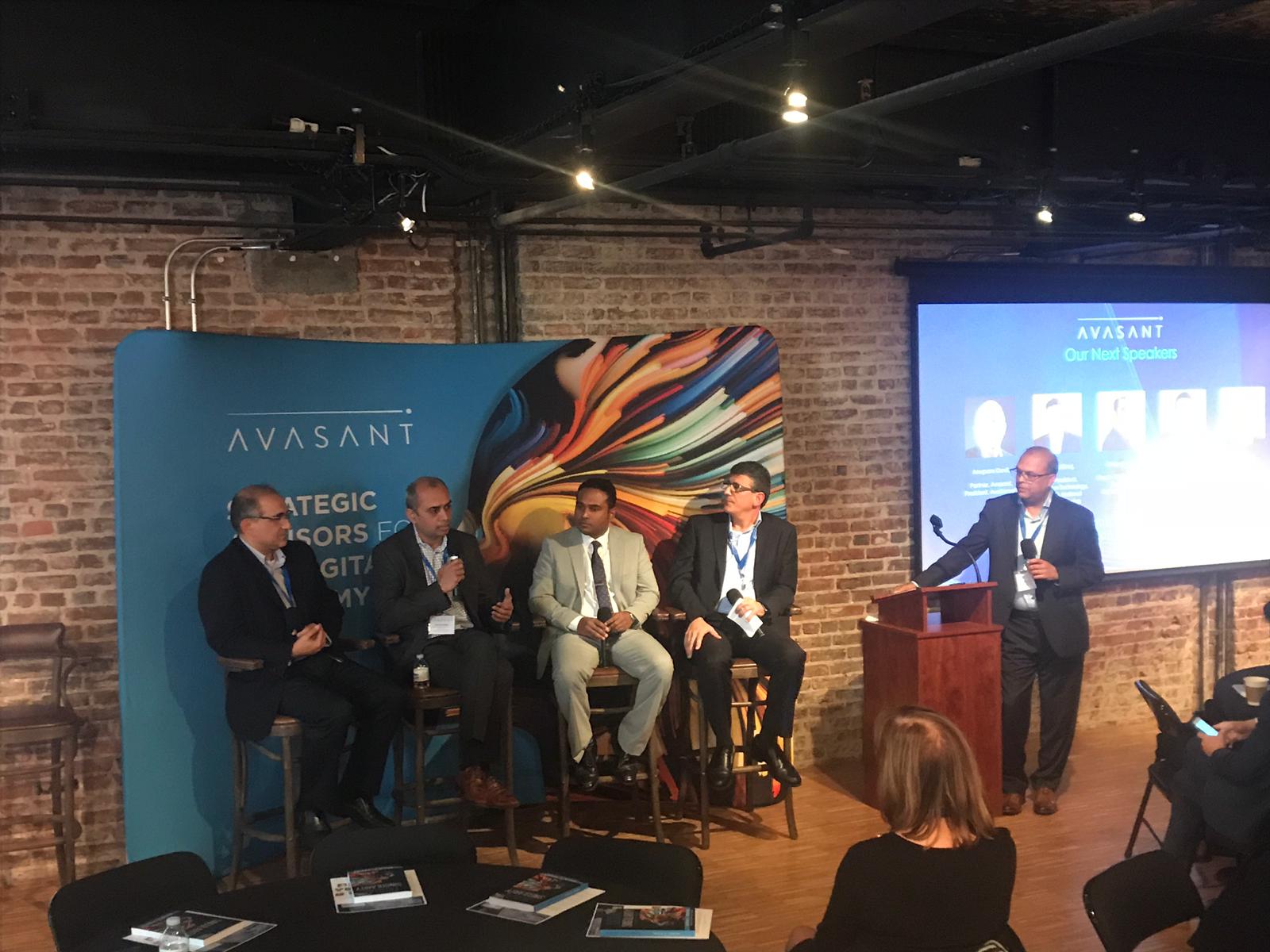 Panelists discuss, "Leveraging Automation, AI and Blockchain in the Transformation Journey"