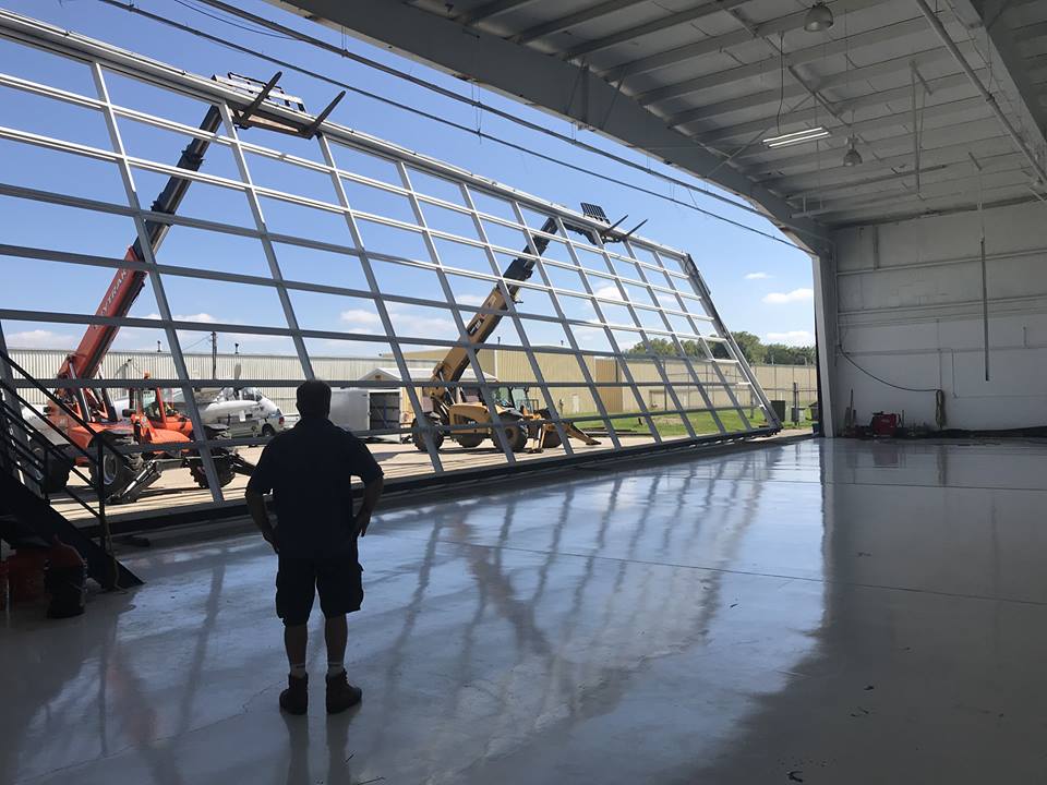 The new door to accommodate super mid-sized jets goes in at RAI Jets.