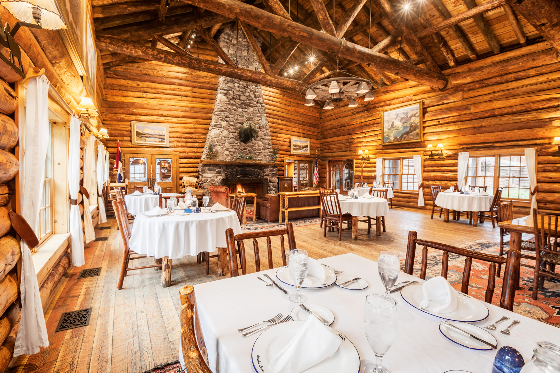 Along with snowy adventures and cozy cabin accommodations, Brooks Lake Lodge offers a variety of gourmet meals in its dining hall to guests – all included in an overnight stay.