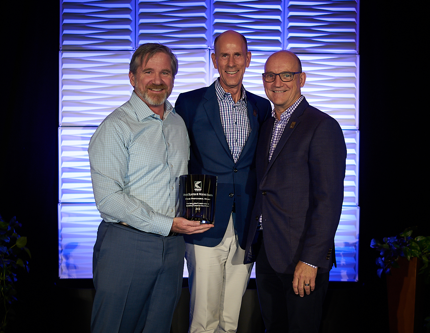 Kolbe Corp CEO David Kolbe (left) awards Wayne Smith (right) and Ross Slater (middle) with the 2018 Kolbe Professional Award.