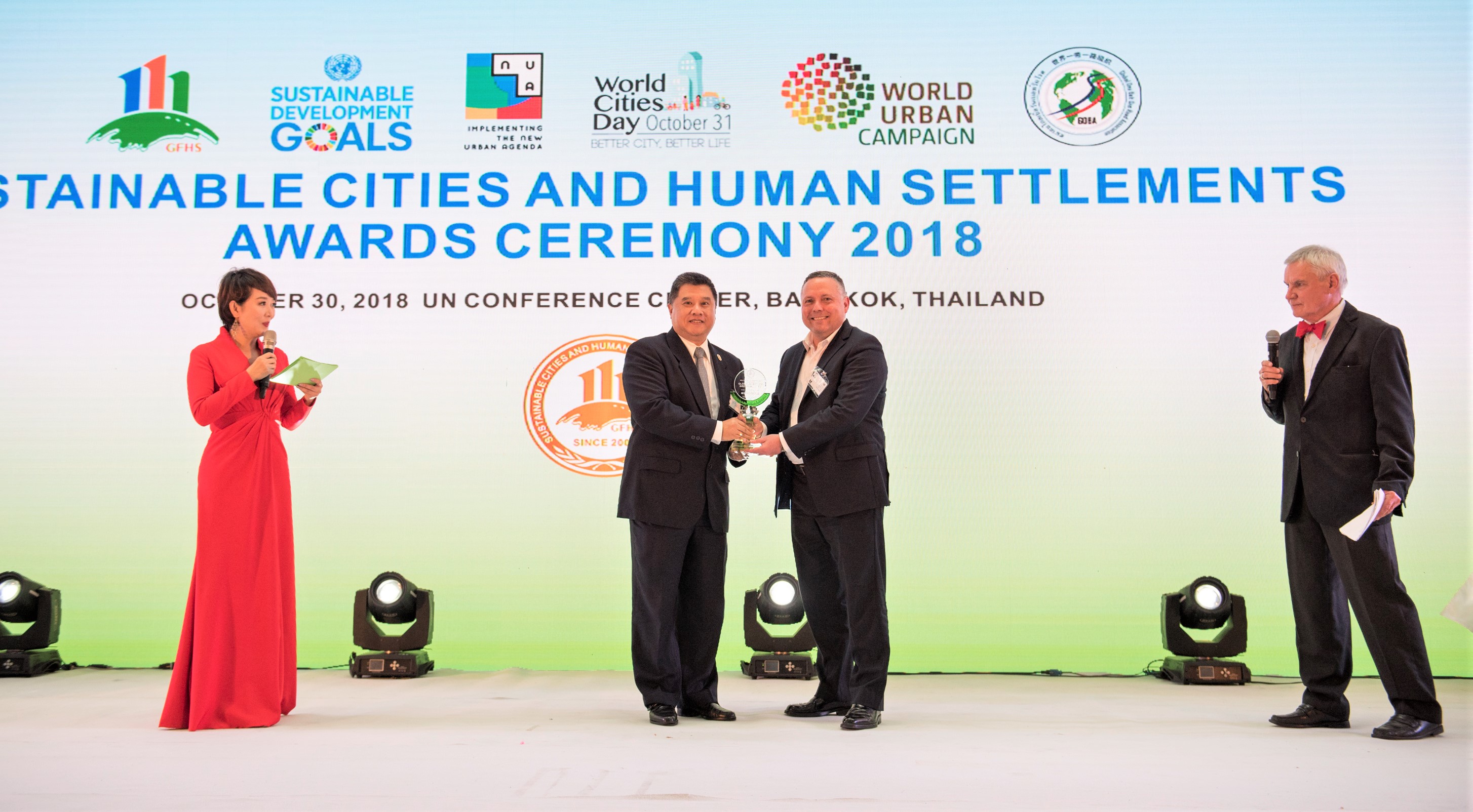 Coast Chairman and CEO David M. Hickey receives the Global Model of Green Mobility Award at the United Nations Conference Center, Bangkok, Thailand.