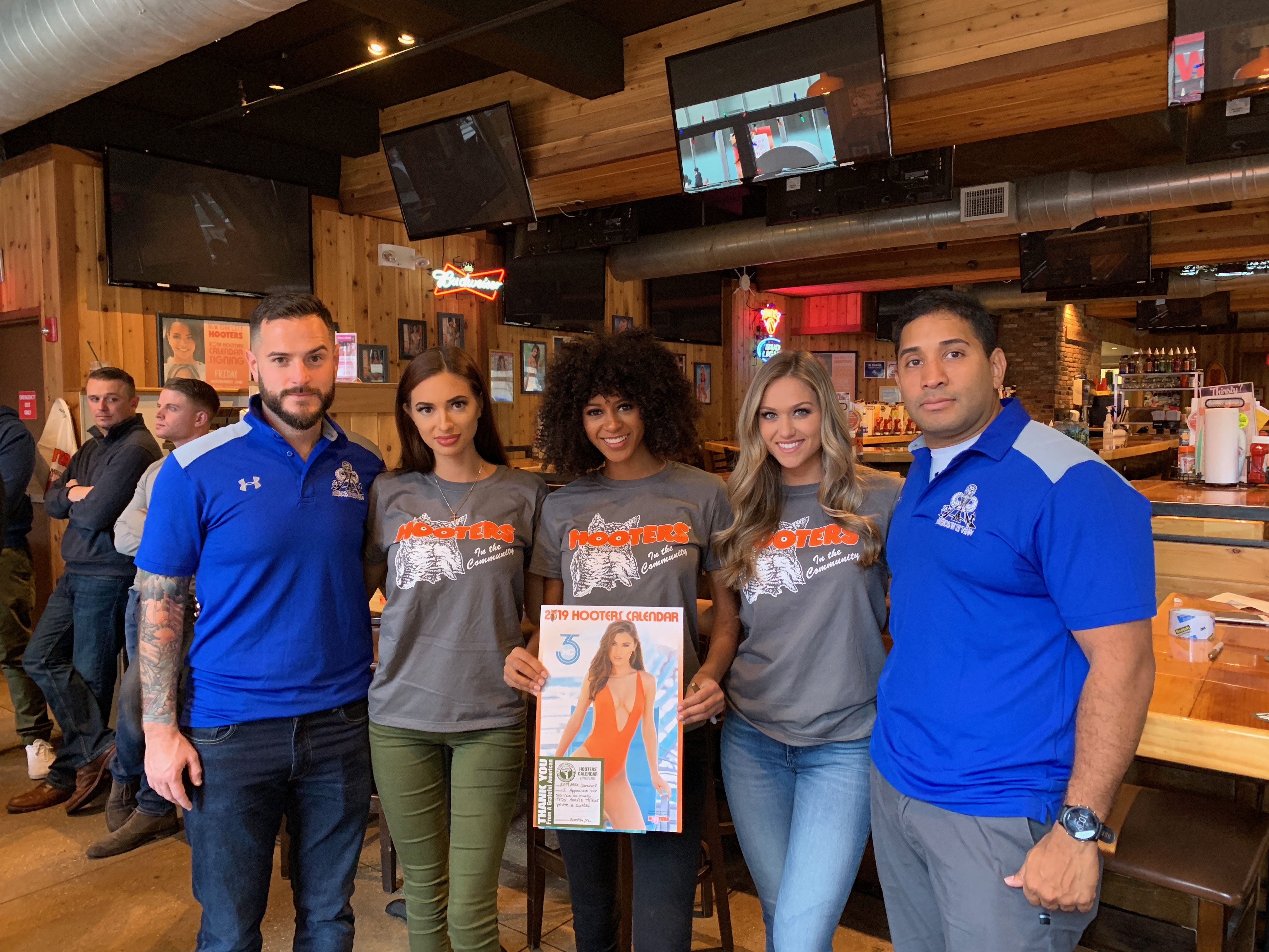 Operation Calendar Drop Distributes Hooters Calendars To Military All