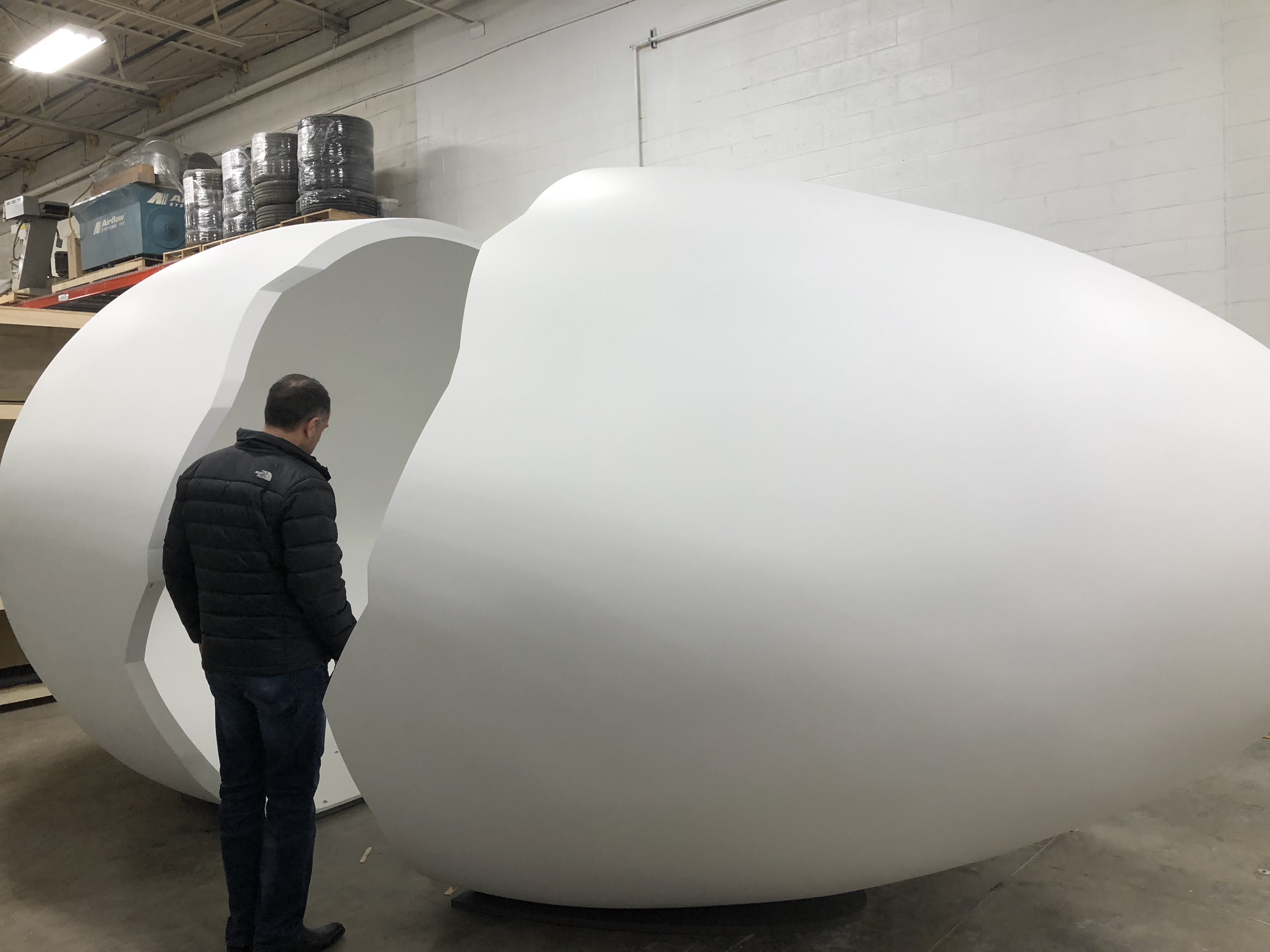 Giant egg created for guest experience attraction.