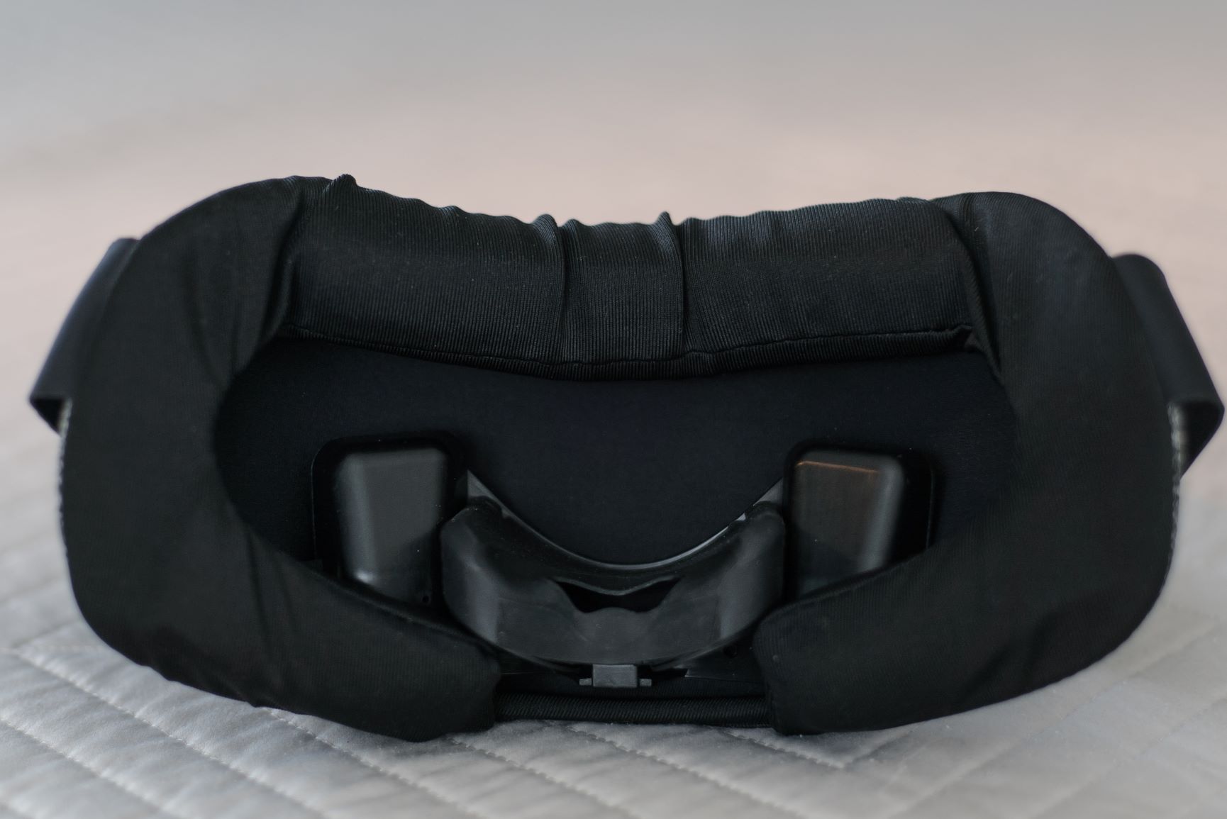 Premium microfiber sleep mask with easily adjustable rear head strap. The detachable sleep mask is machine-washable. The removable silicone nose piece can be washed in the sink with gentle soap.