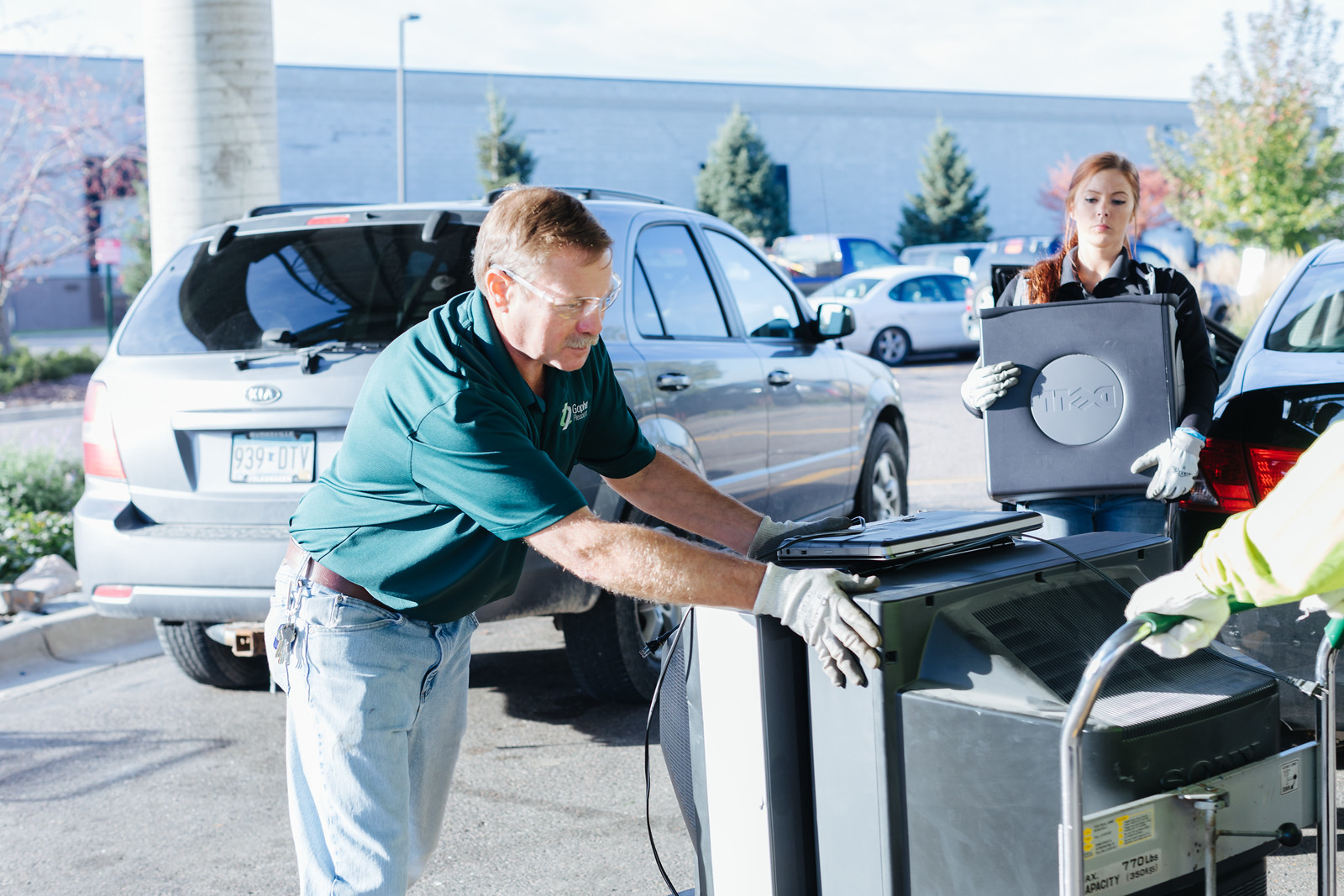 Gopher Resource employees recycling electronics at the Dakota County Recycling Zone.