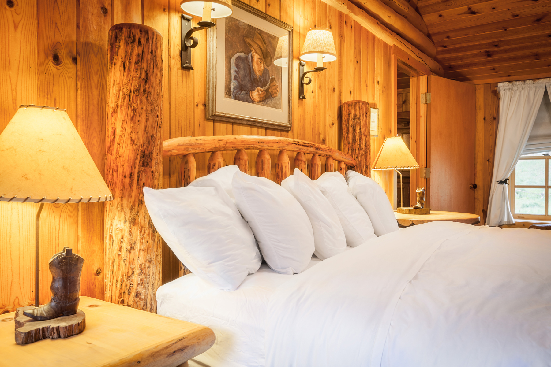 Plush goose down comforter-covered beds are in all rooms and cabins at Wyoming’s secluded and exclusive Brooks Lake Lodge for a luxurious slumber.