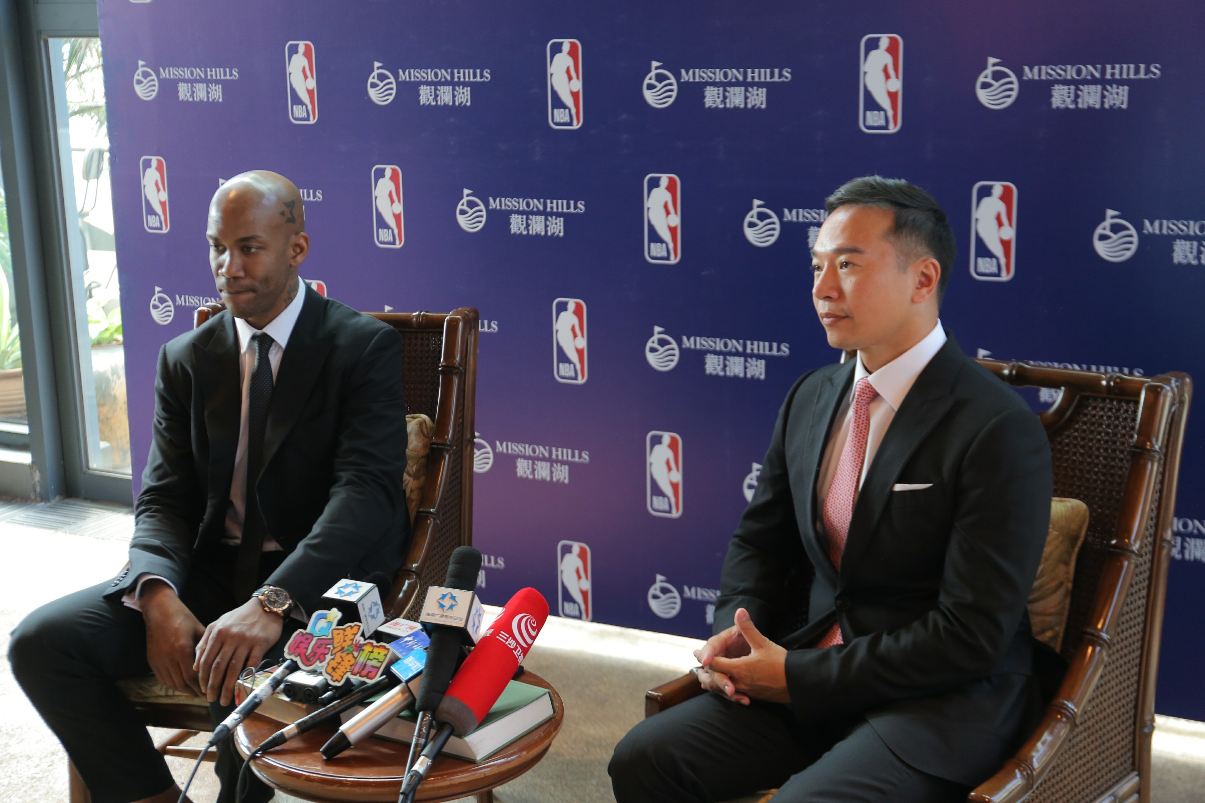 Photo 5 – Stephon Marbury and Tenniel Chu, Group Vice Chairman, Mission Hills Group answer questions from the media at the official opening of the NBA Exhibit at Mission Hills Haikou in Hainan, China