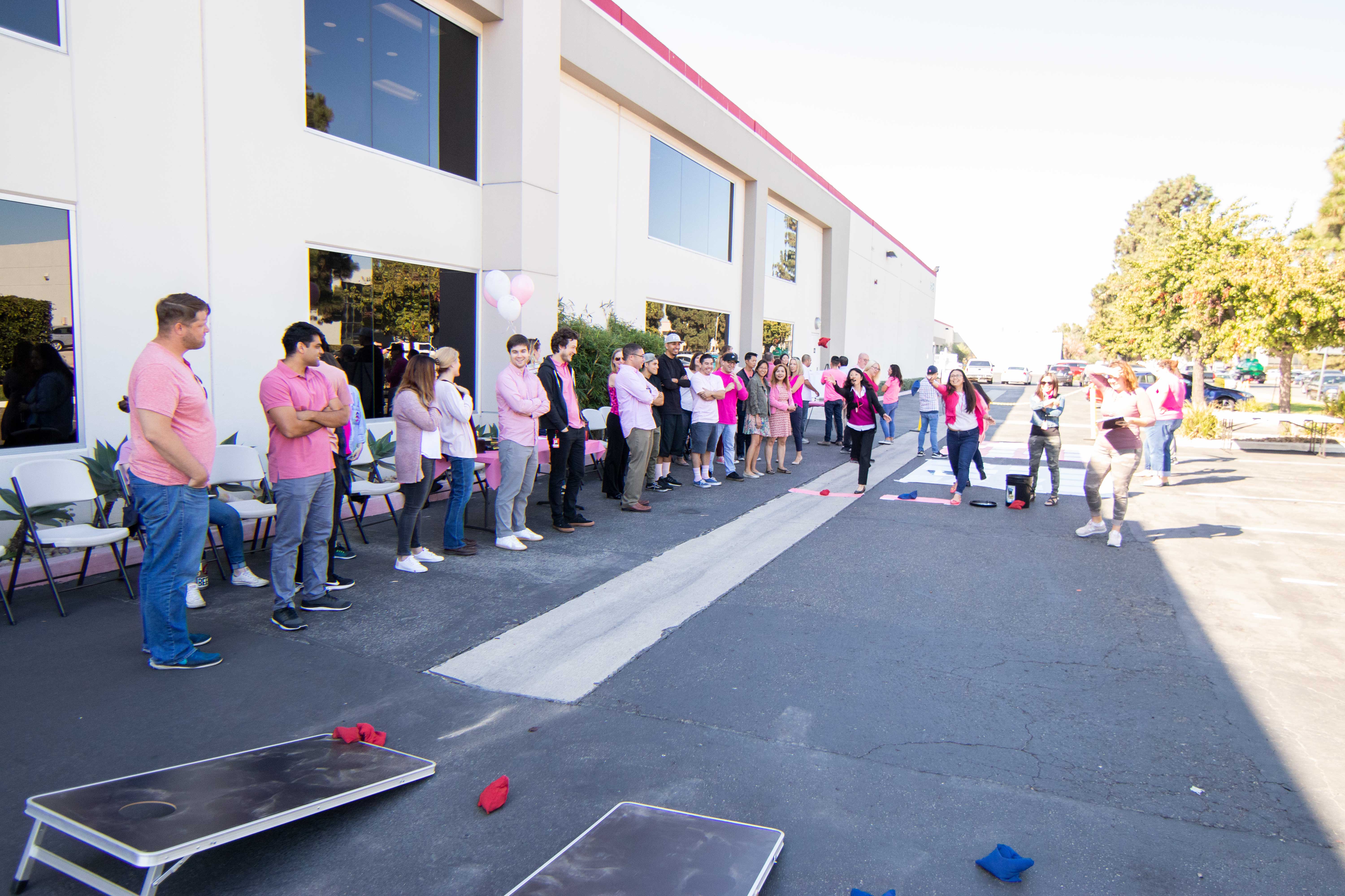 The corn hole matches were intense among the staff, as part of the TCM Triathlon for a Cure.