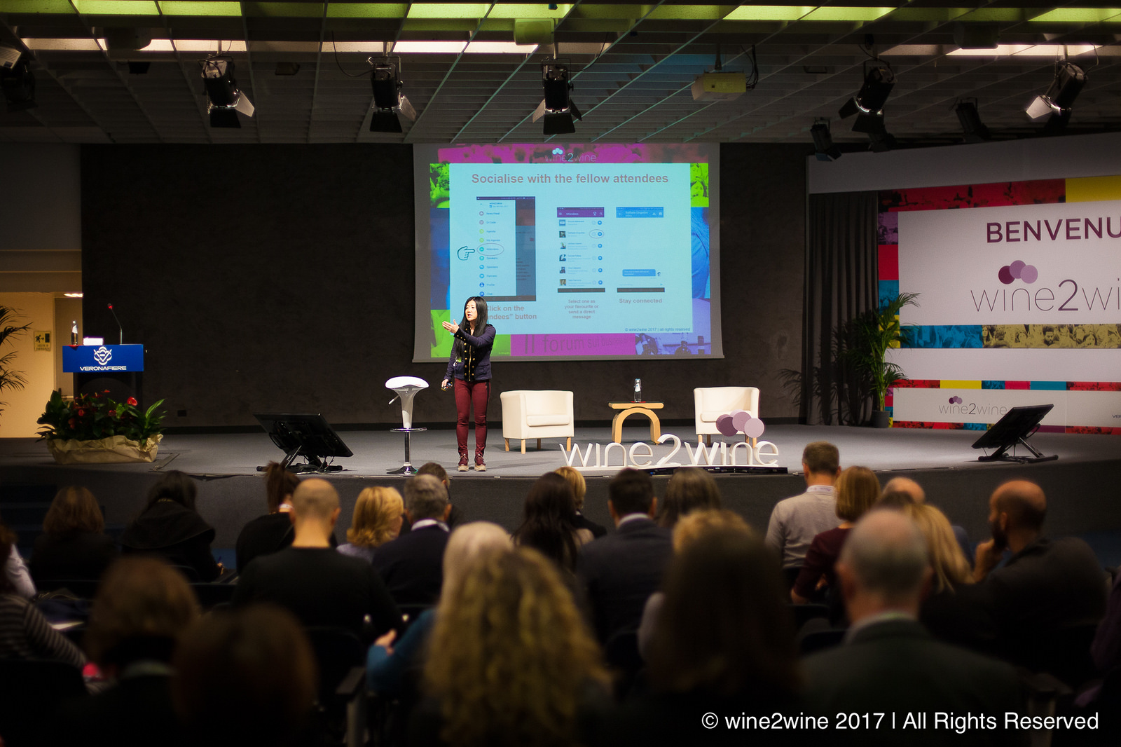 Photograph: On stage Stevie Kim, Managing Director of Vinitaly International, at the opening session of wine2wine 2017 in Veronafiere’s PalaExpo.