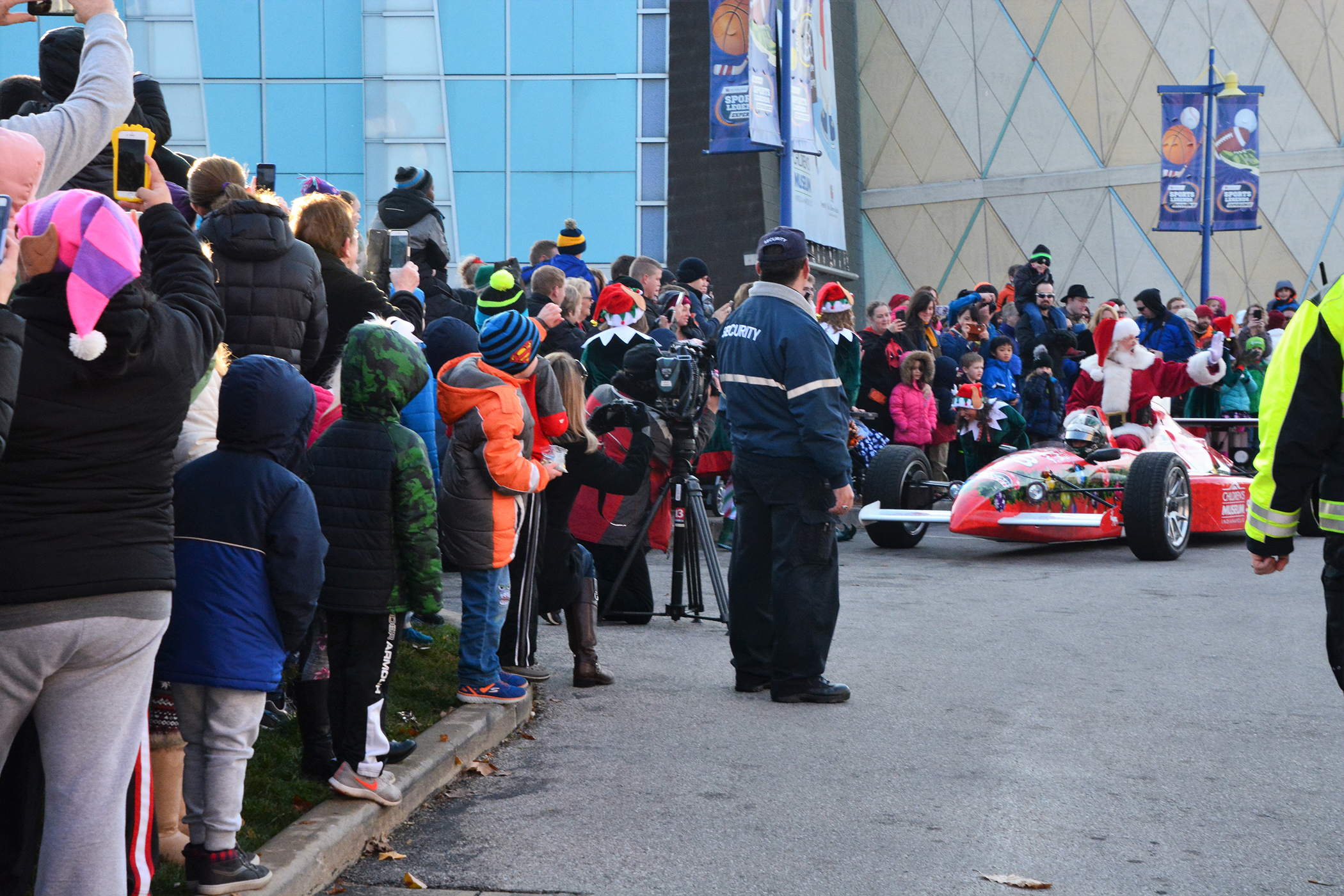 Zoom zoom Santa!  Free hot cocoa kept good little boys and girls toasty as they waited for Santa to zoom in to the world's largest children's museum in a race car!  Santa's Big Arrival at The Children