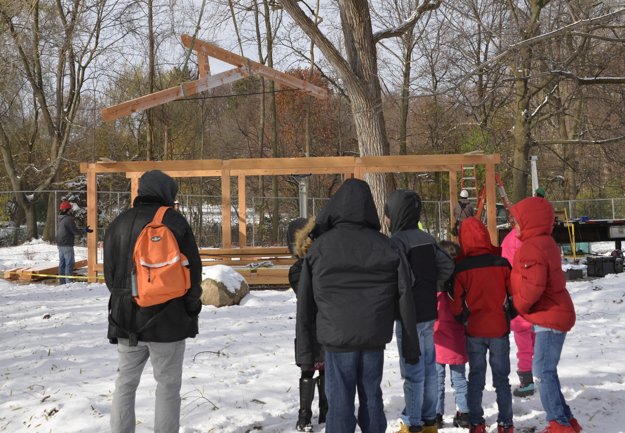 Children, teachers, and administration of Rochester Childfirst Network celebrated the raising of their timber frame outdoor pavilion/classroom by New Energy Works Timberframers.