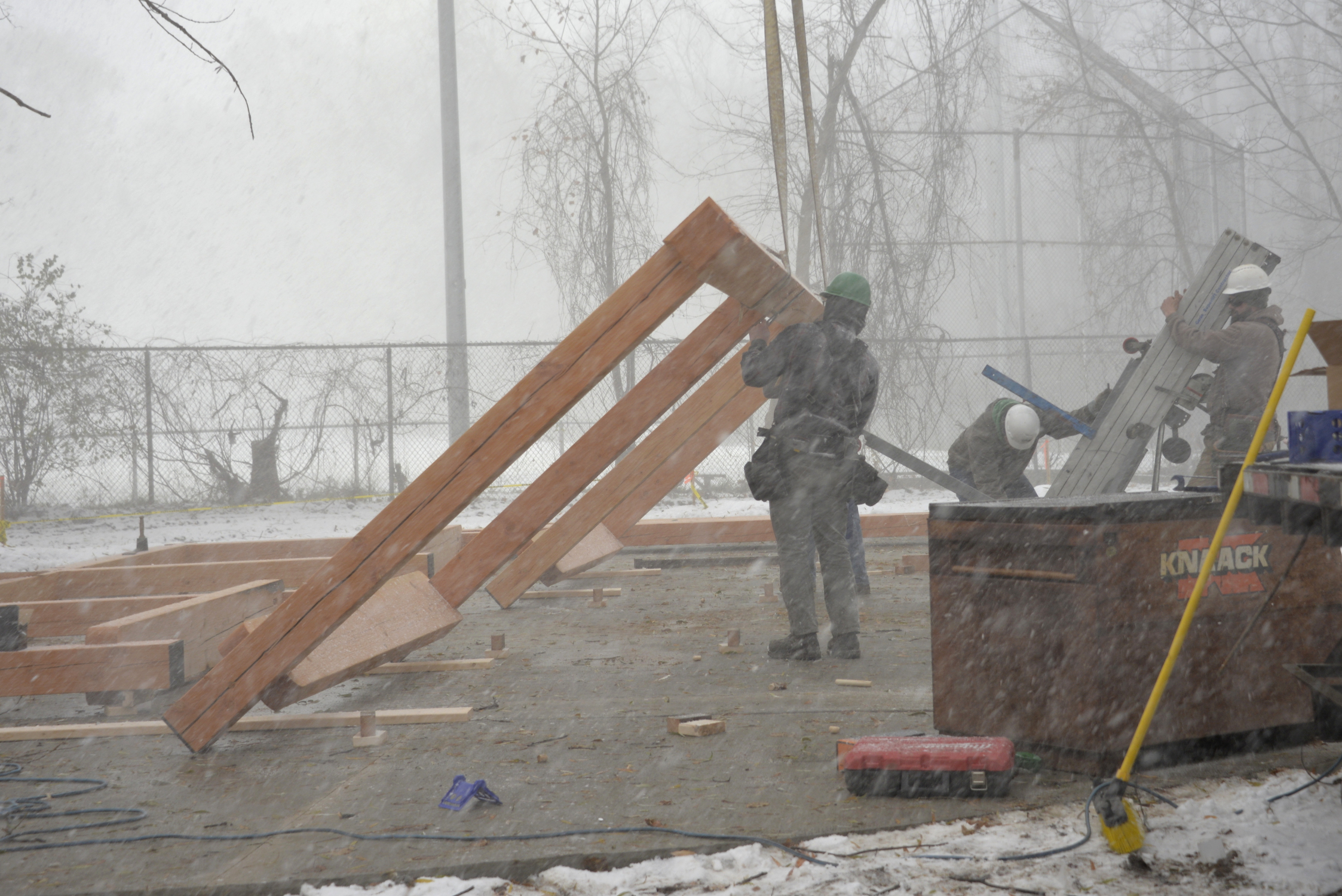 Working through winter weather the timber frame outdoor pavilion/classroom for the Rochester Childfirst Network was raised by New Energy Works craftsmen.