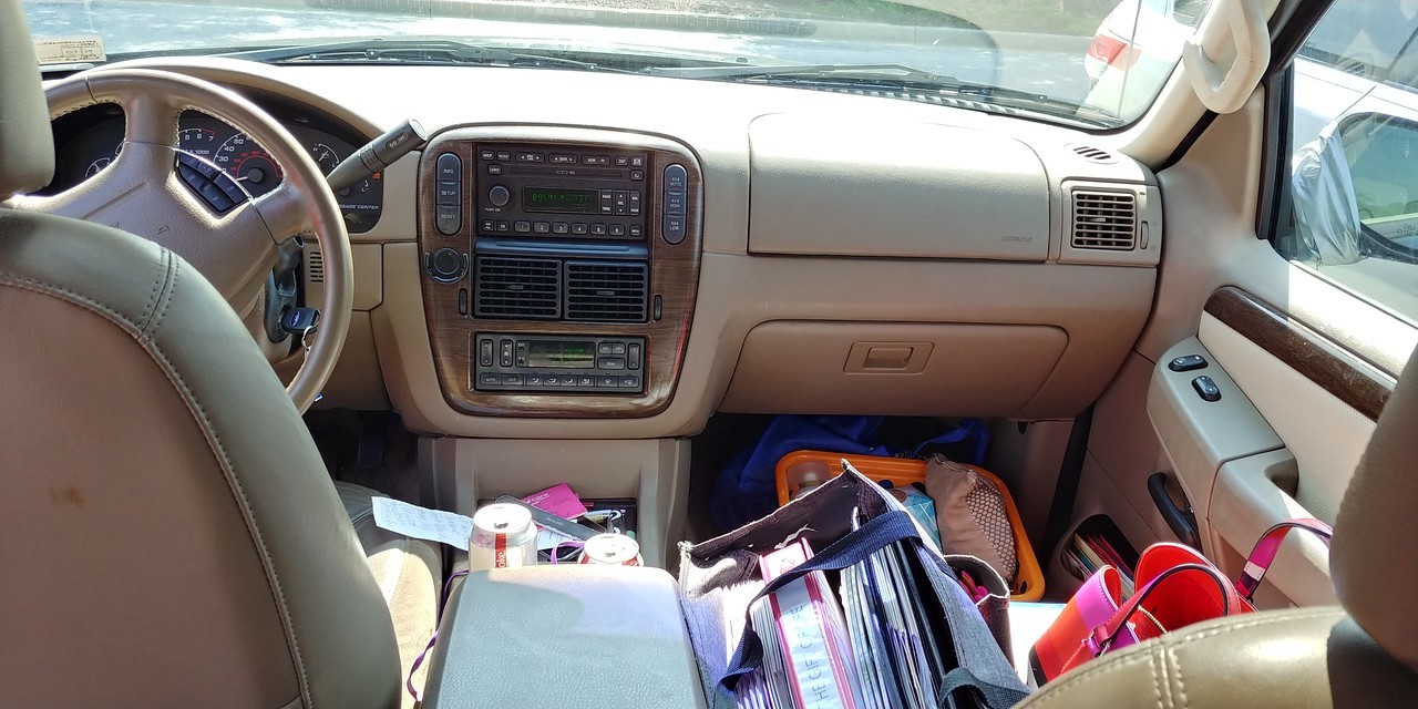 Organizers contain papers and items in this busy SUV