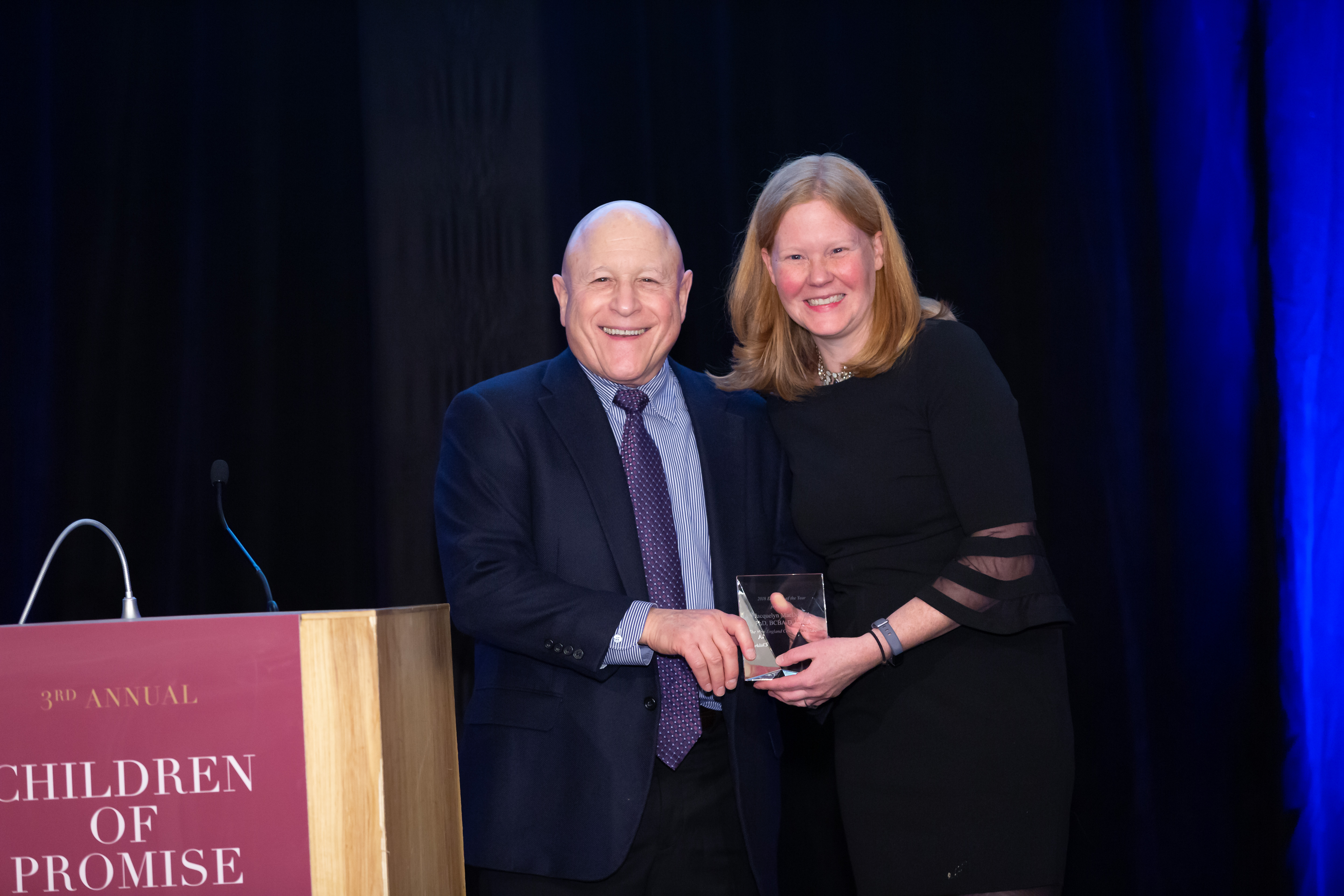 NECC President and CEO, Vinnie Strully, with Educator of the Year, Jacquelyn MacDonald, PhD, of Regis College