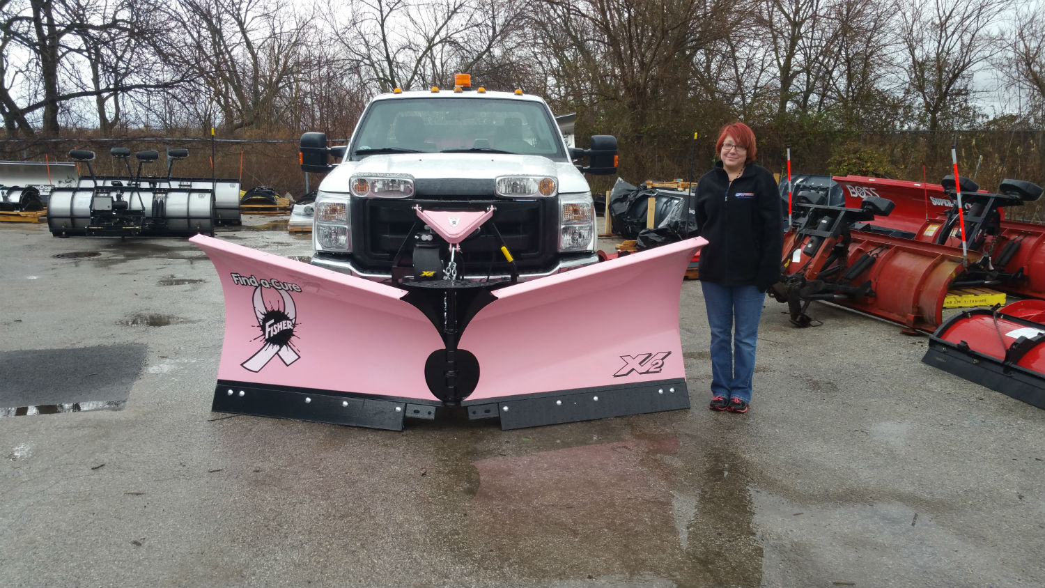 Mary B. standing next to Fisher "Pink Plow"