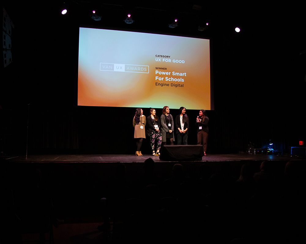 The Engine Digital team accepting their award for best UX for Good