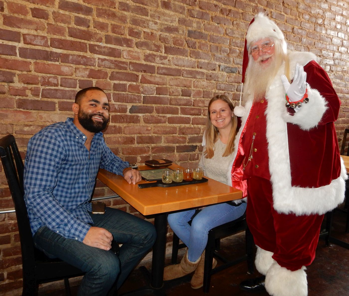 Santa Claus stopped by Haley’s Honey Meadery to say hello to Megan McGrath and Eddie Fischer, who were tasting the four meads on tap.