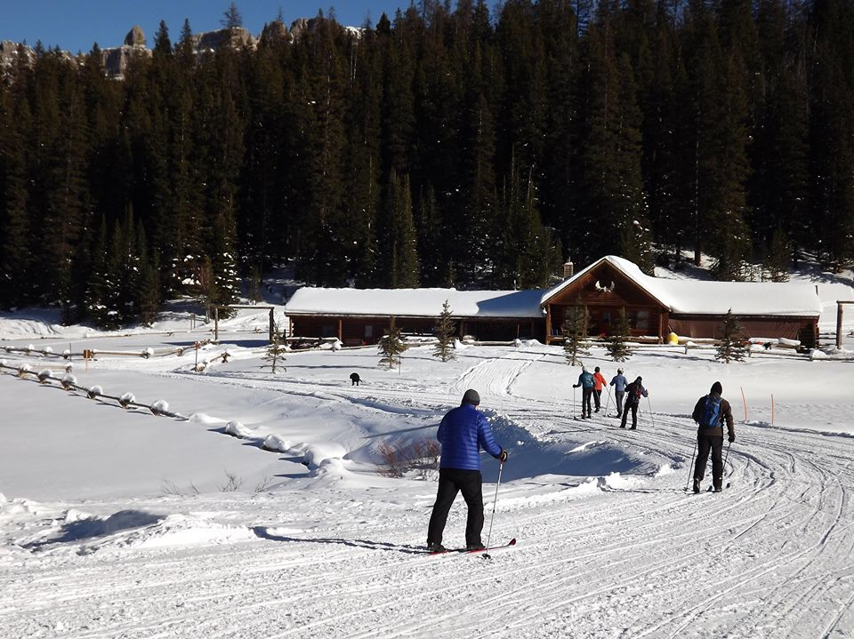 Some people ski or snowmobile many miles to enjoy a hearty gourmet lunch in the great hall at historic guest ranch Brooks Lake Lodge deep in Wyoming’s Shoshone National Forest each winter.