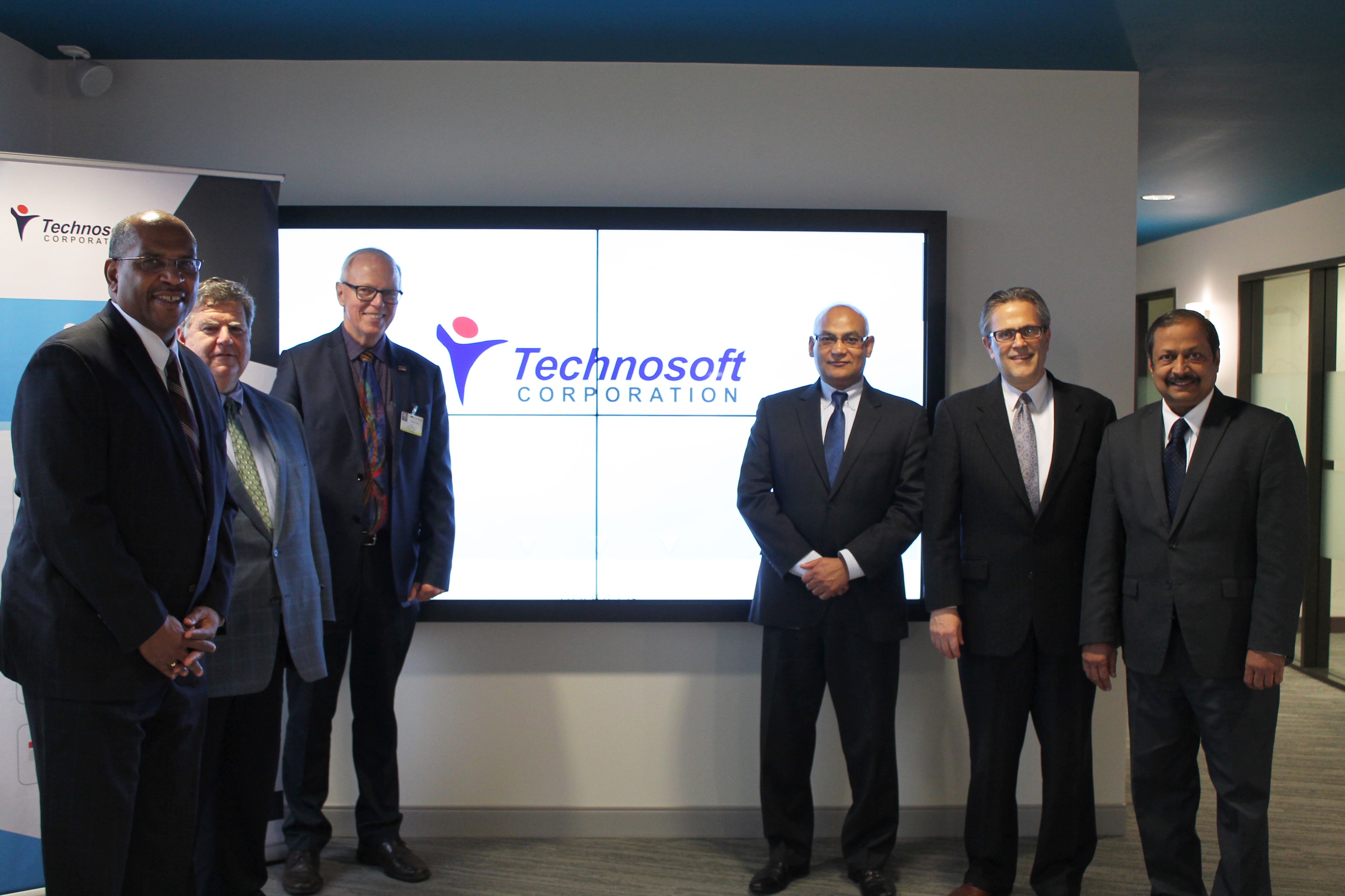 Mark Adams (Oakland County), Fred Zorn (City of Southfield Manager), Ken Siver (City of Southfield Mayor), Radha Krishnan (Technosoft CEO), Glenn Moore (Technosoft VP), Mandar Kulkarni (Technosoft EVP