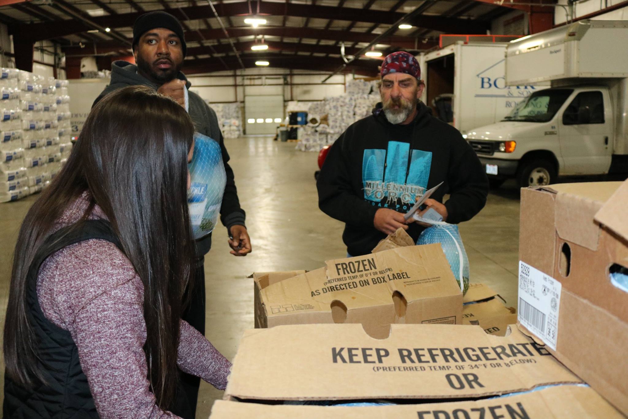 Turkeys are handed out to staff at Boak & Sons in celebration of a safe roofing season.