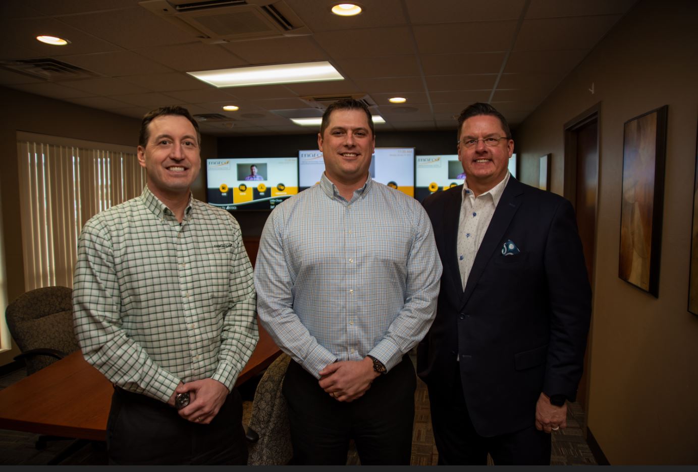 Pictured Left to Right: Jonathan Warrey, Chief Operating Officer, Marco, Jake Vande Hey, Director of IT Sales, Marco (formerly ESG), Todd Erne, President of IT Division, Marco