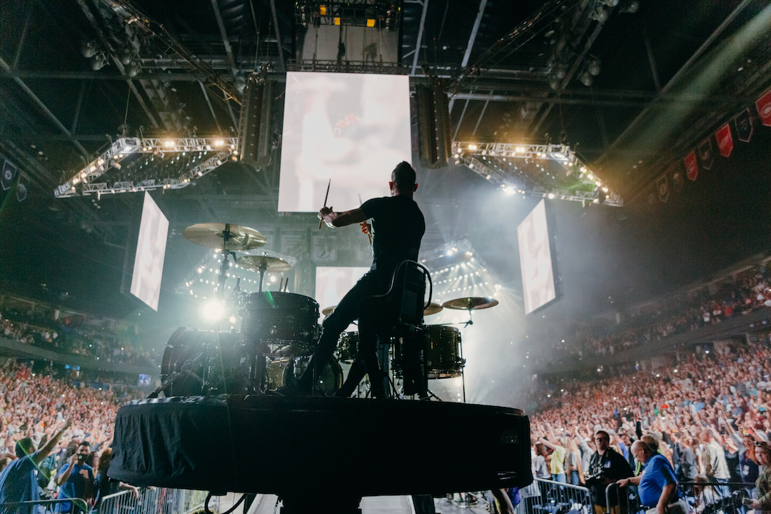 Newsboys United's Duncan Phillips performs on the Winter Jam 360º stage.