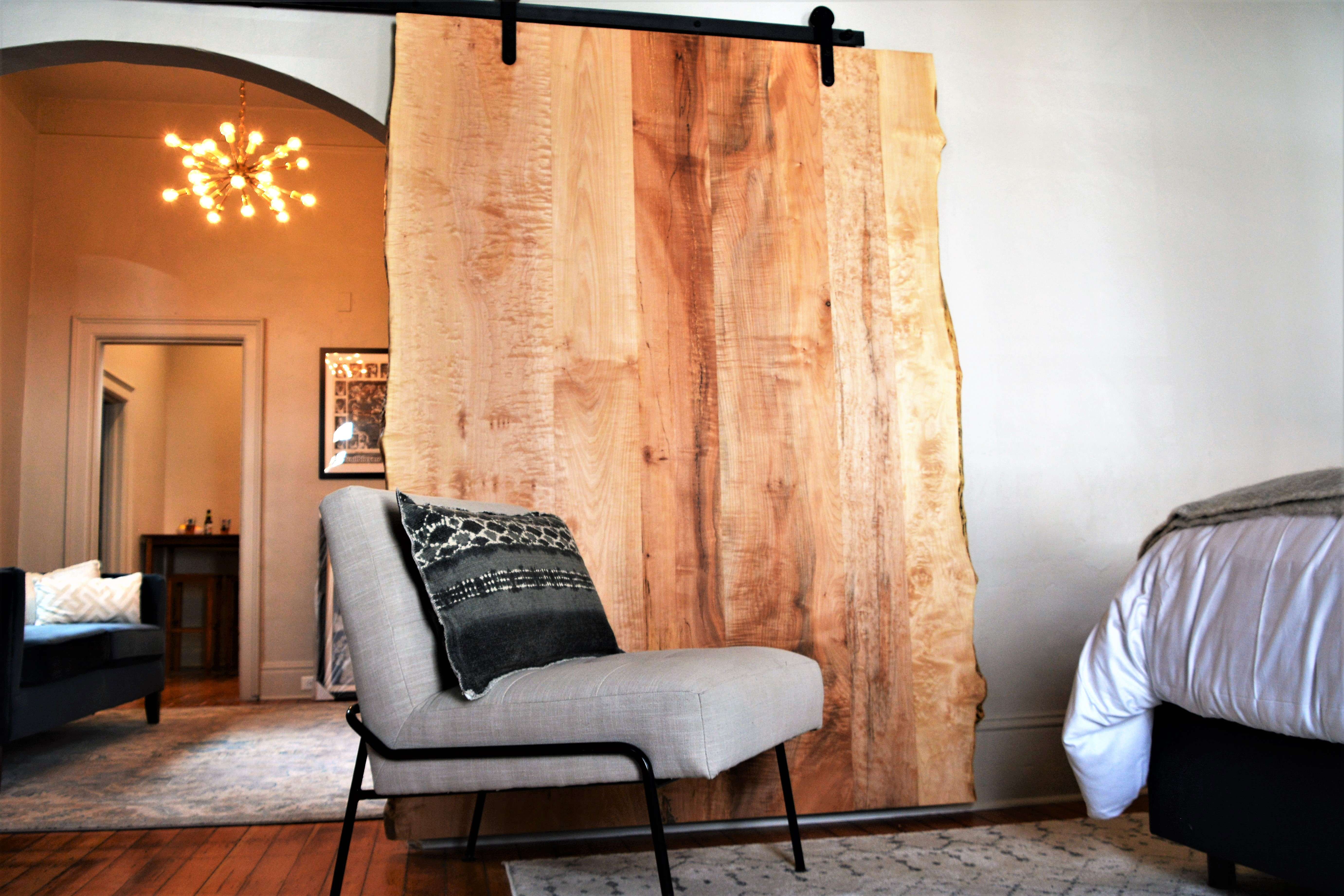 Each tiny home features local fixtures like barn door from Krownlab.