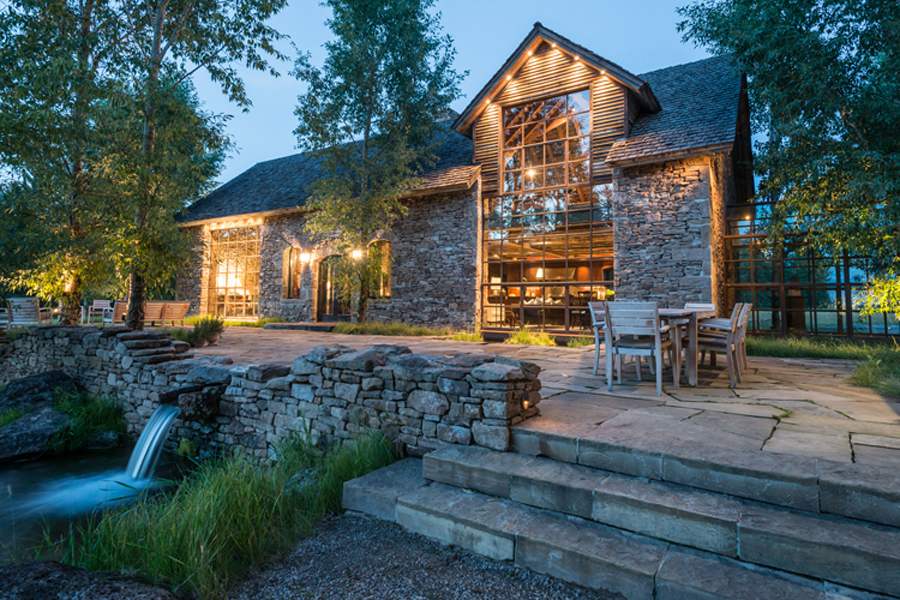 JLF Architects took an abandoned dairy barn from the 1800s and reimagined and rebuilt it stone by stone into the form of a contemporary home in Jackson Hole, Wyoming (photo by Audrey Hall.)