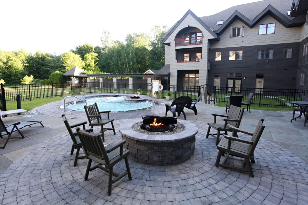 After a hike, soak in the 20 person hot tub surrounded by mountains and a fire pit.