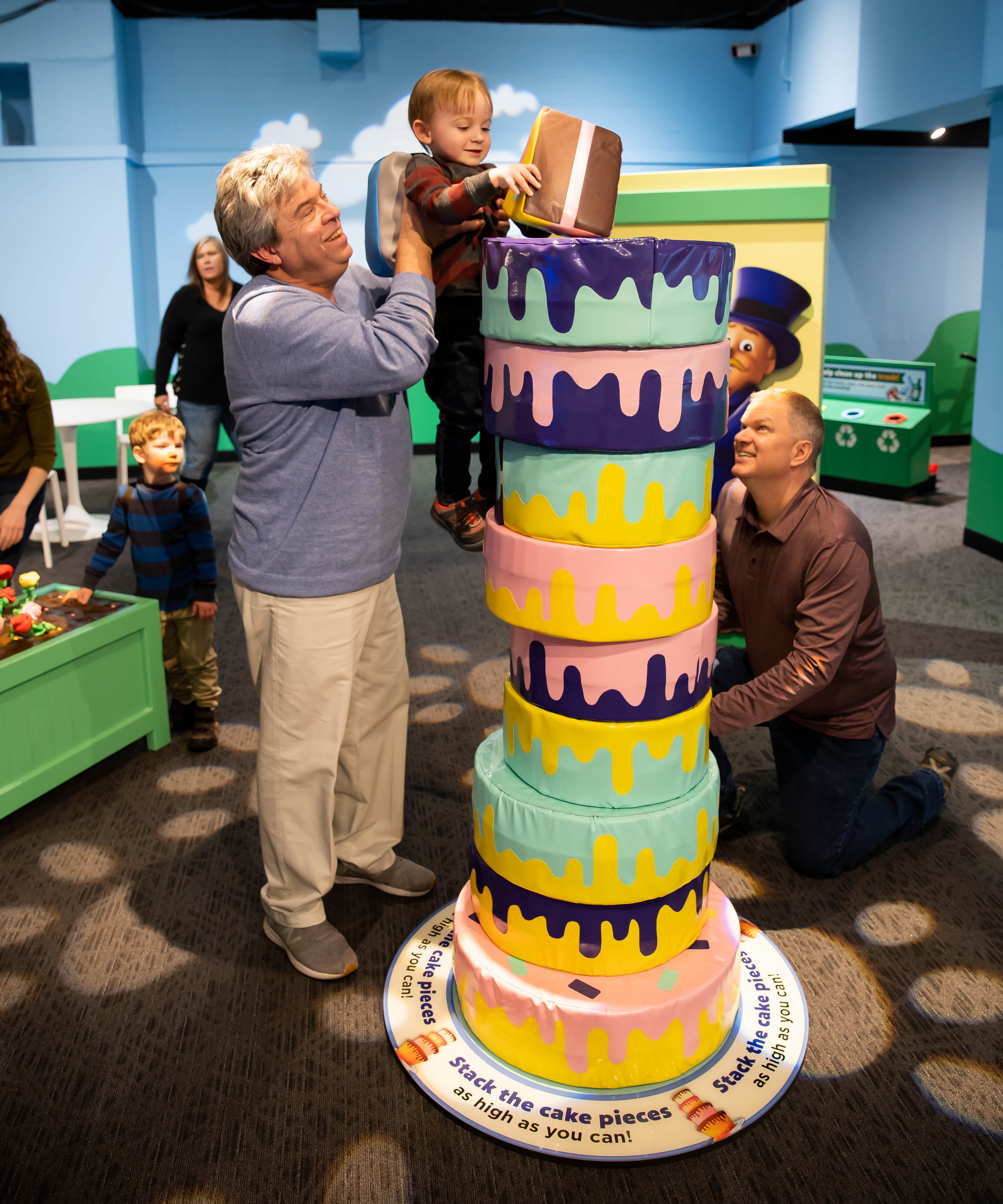 Families help solve the case of the crashed cake at the world's largest children's museum.