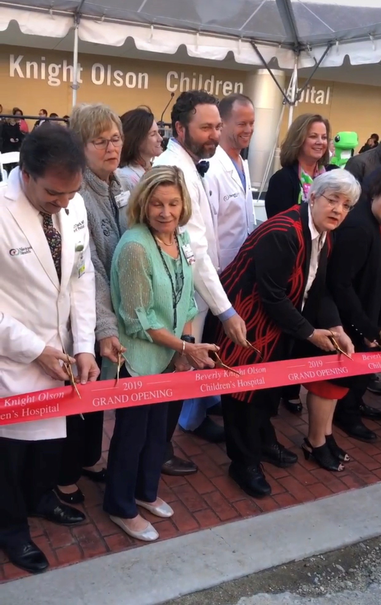 Navicent Health staff cut the ribbon to the new Beverly Knight Olson Children's Hospital.