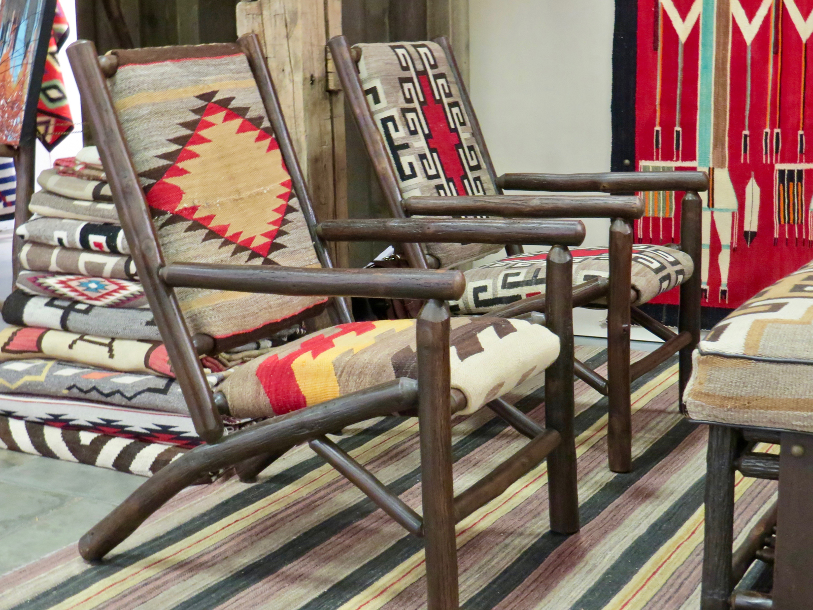The Western Design Conference Exhibit + Sale showcases an extraordinary variety of furniture for the home such as these Pendleton-upholstered chairs by Old Hickory Furniture Company.