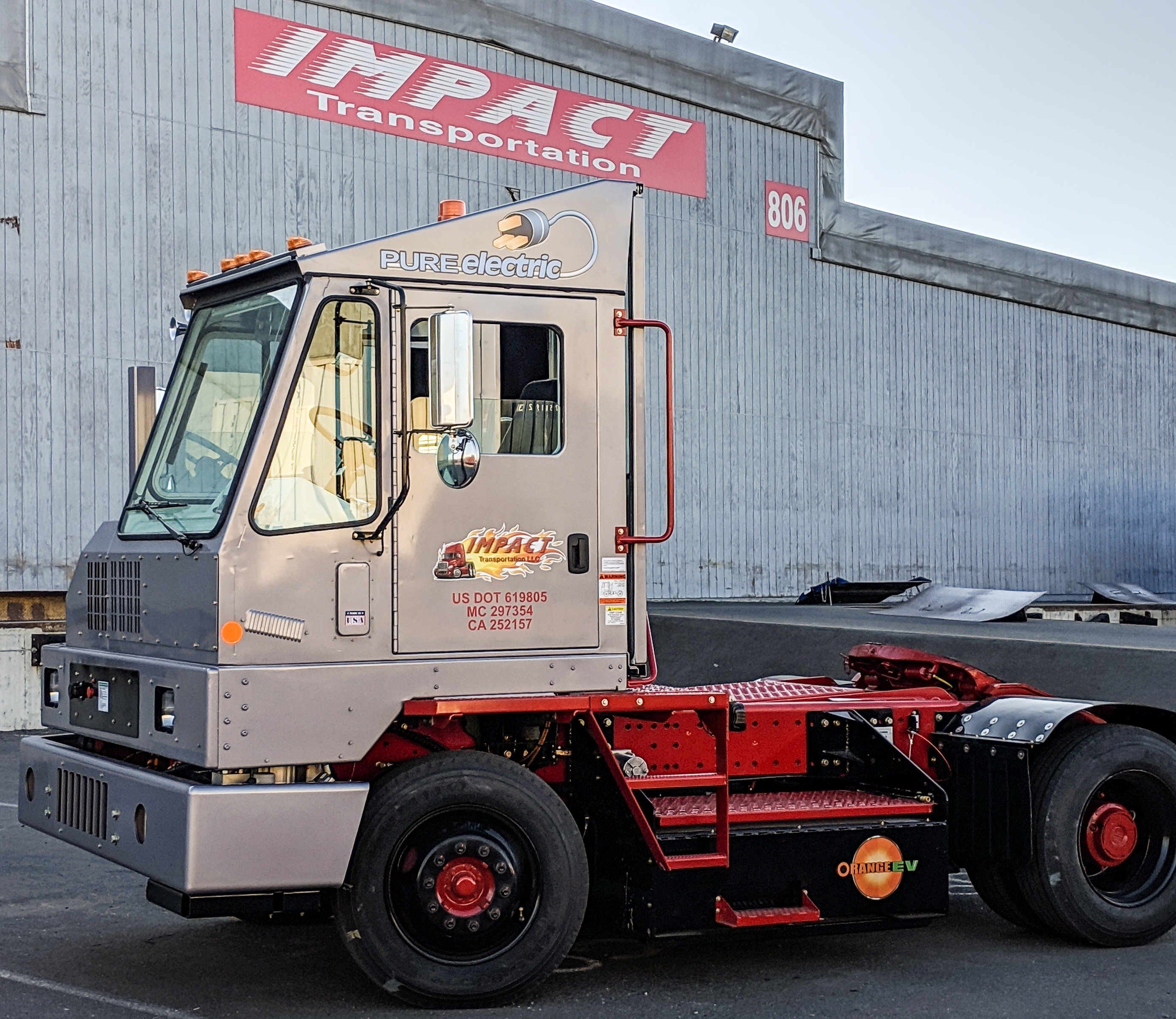 Impact Transportation Deploys Orange EV Electric Terminal Truck to the Port of Oakland