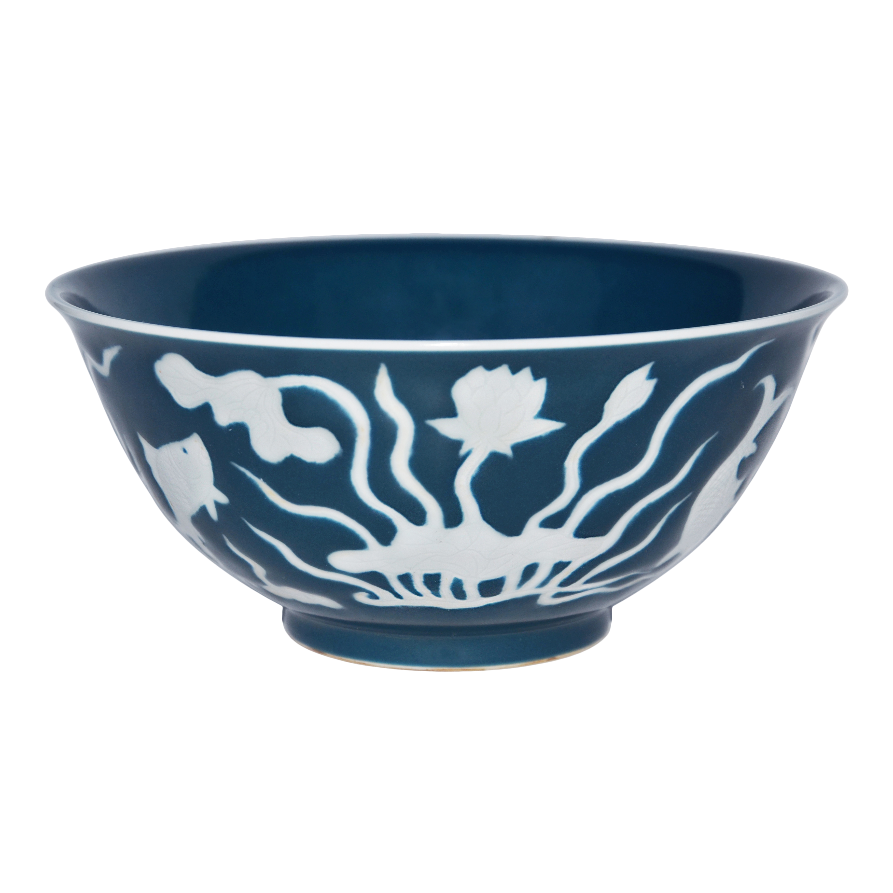 Seven inch porcelain bowl carved in relief sold at Gianguan Auctions in March 2018.