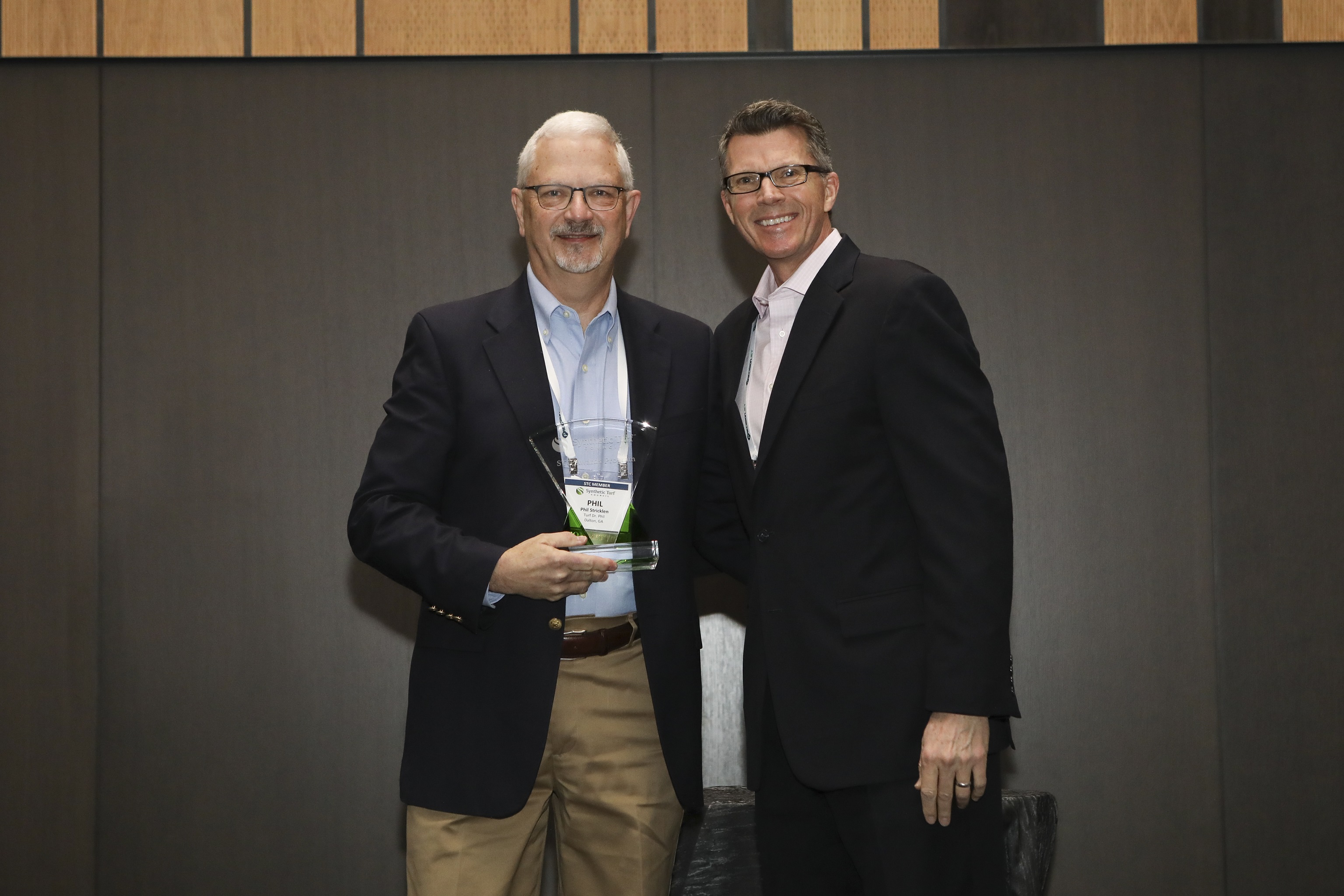 Kevin Barker, Chairman of the STC Board of Directors, presents the 2019 STC Lifetime Achievement Award to Dr Phil Stricklen, of TurdDrPhil.com